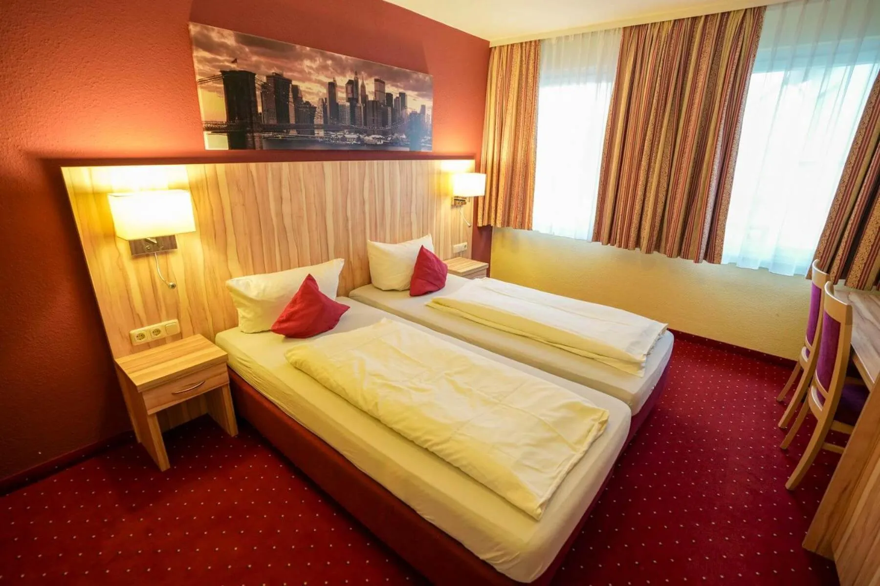 Bed in Hotel Weinhaus Kreuter