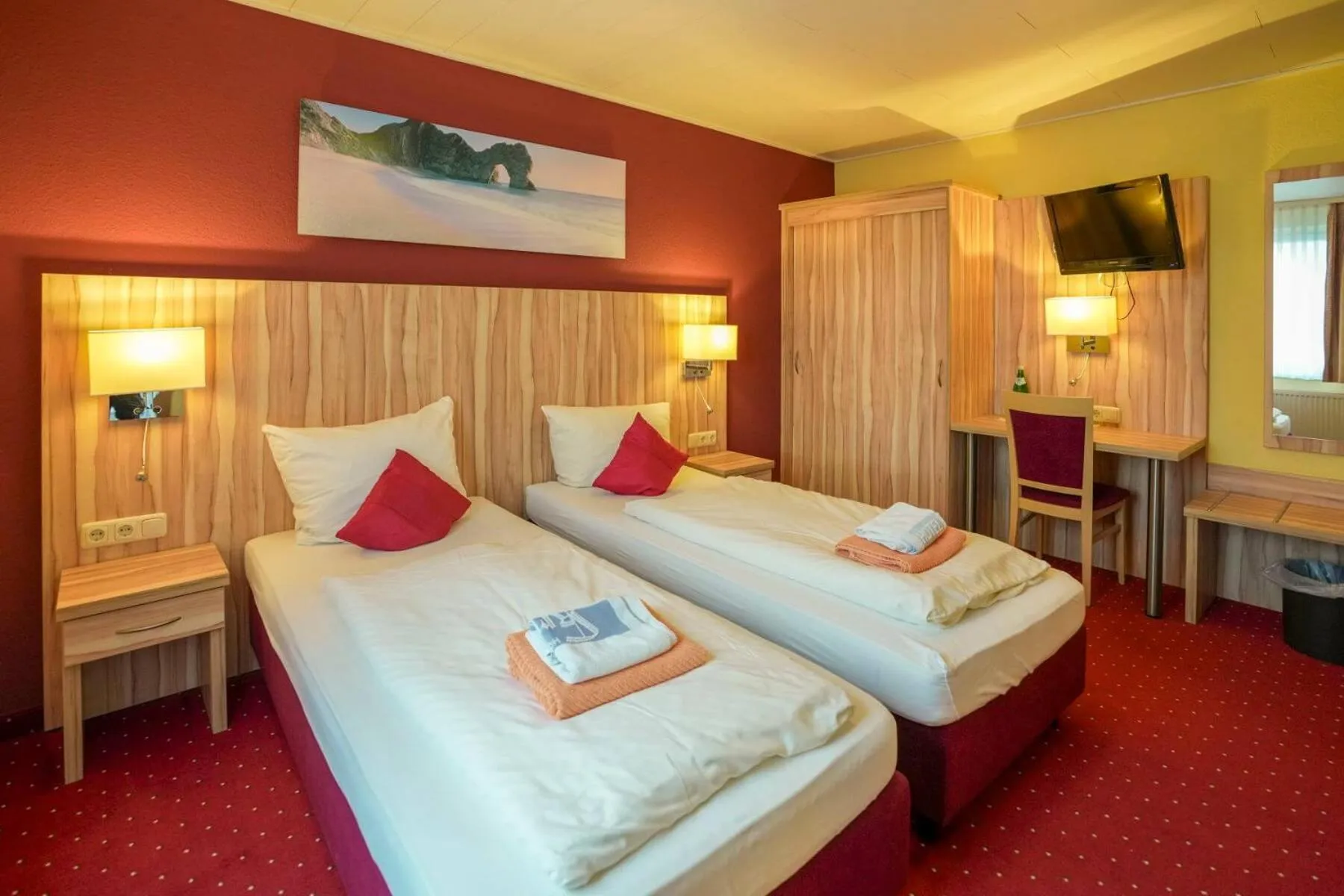 Bed in Hotel Weinhaus Kreuter