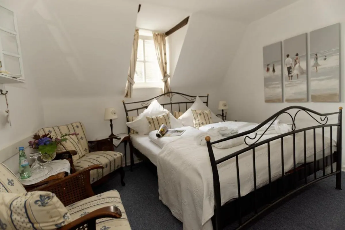 Photo of the whole room, Bed in Burghaus & Villa Kronenburg