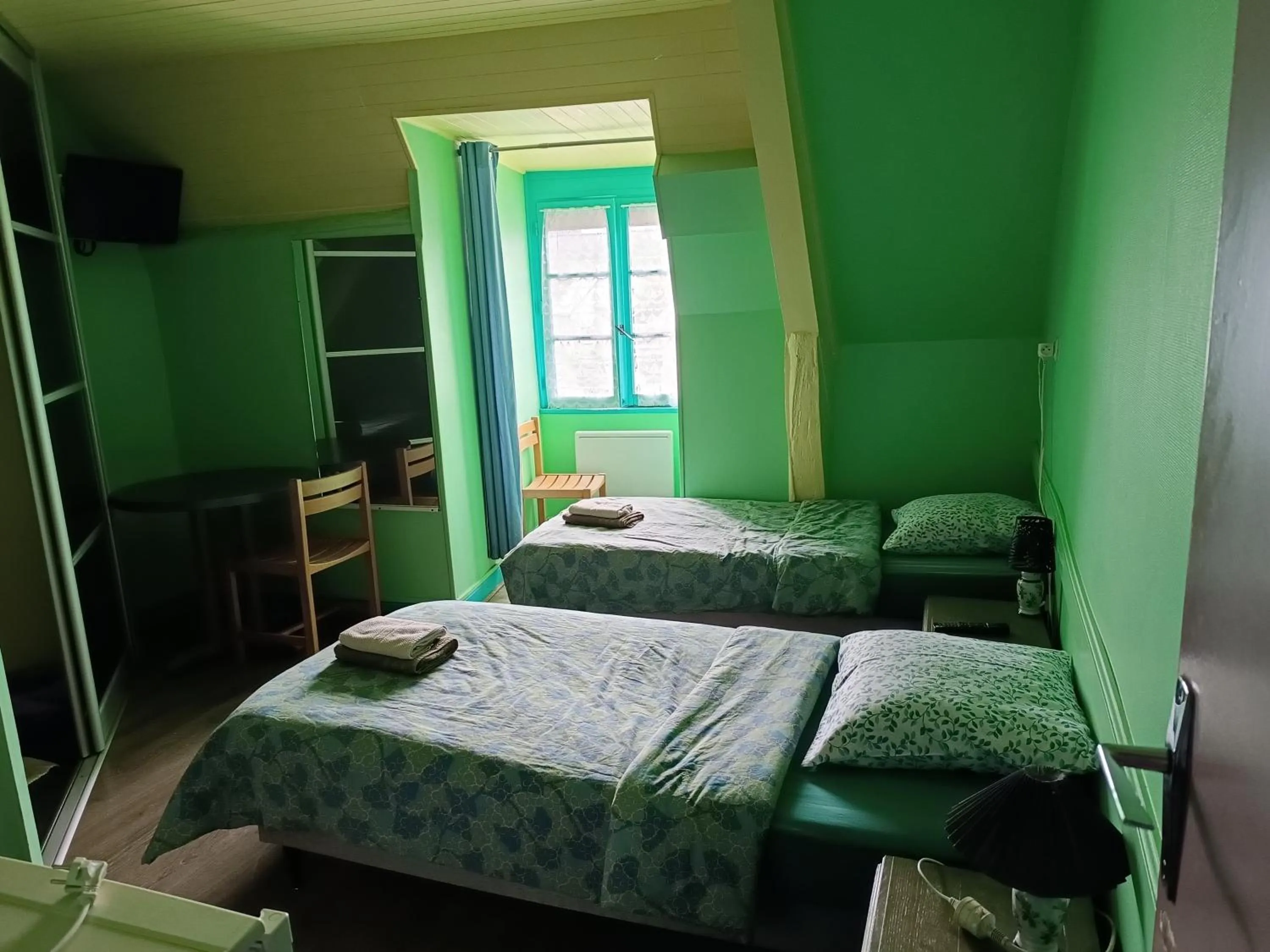 Bed in Auberge Du Bon Coin