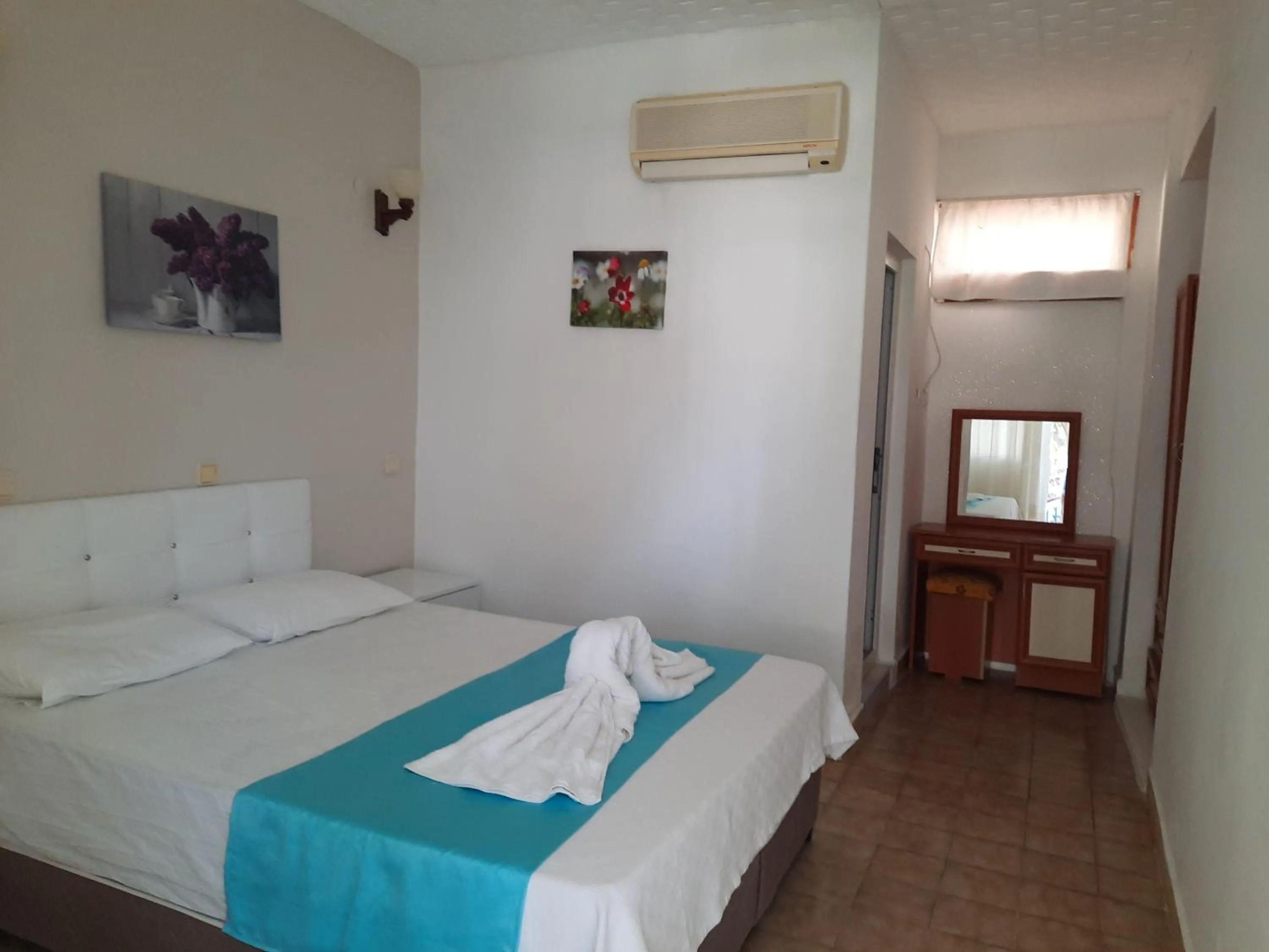 Bed in Adrasan Maviay Hotel