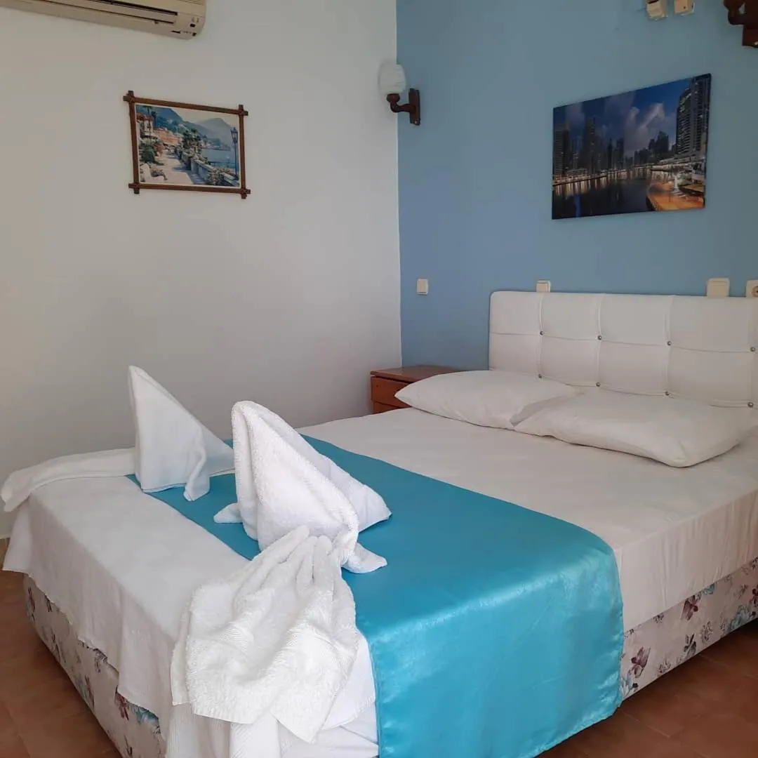 Bed in Adrasan Maviay Hotel