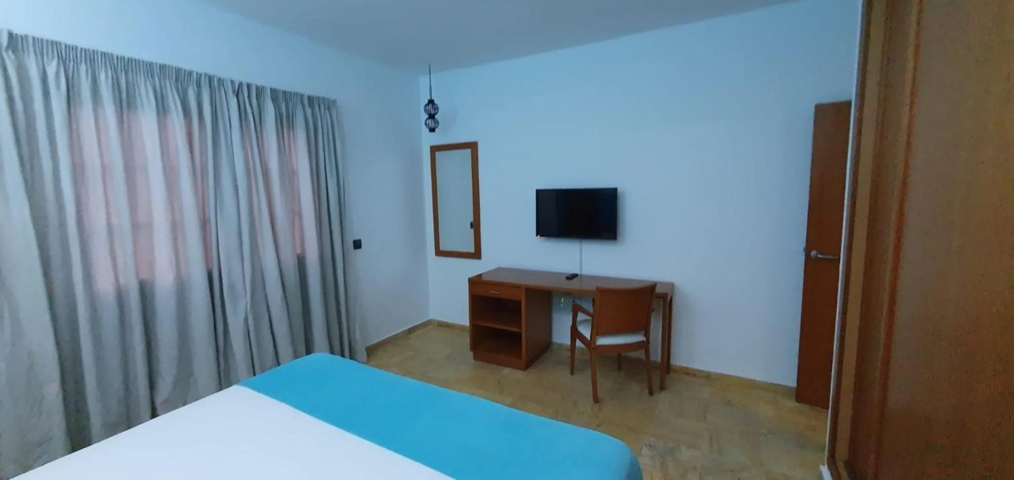 Bedroom, TV/Entertainment Center in VIK Coral Beach