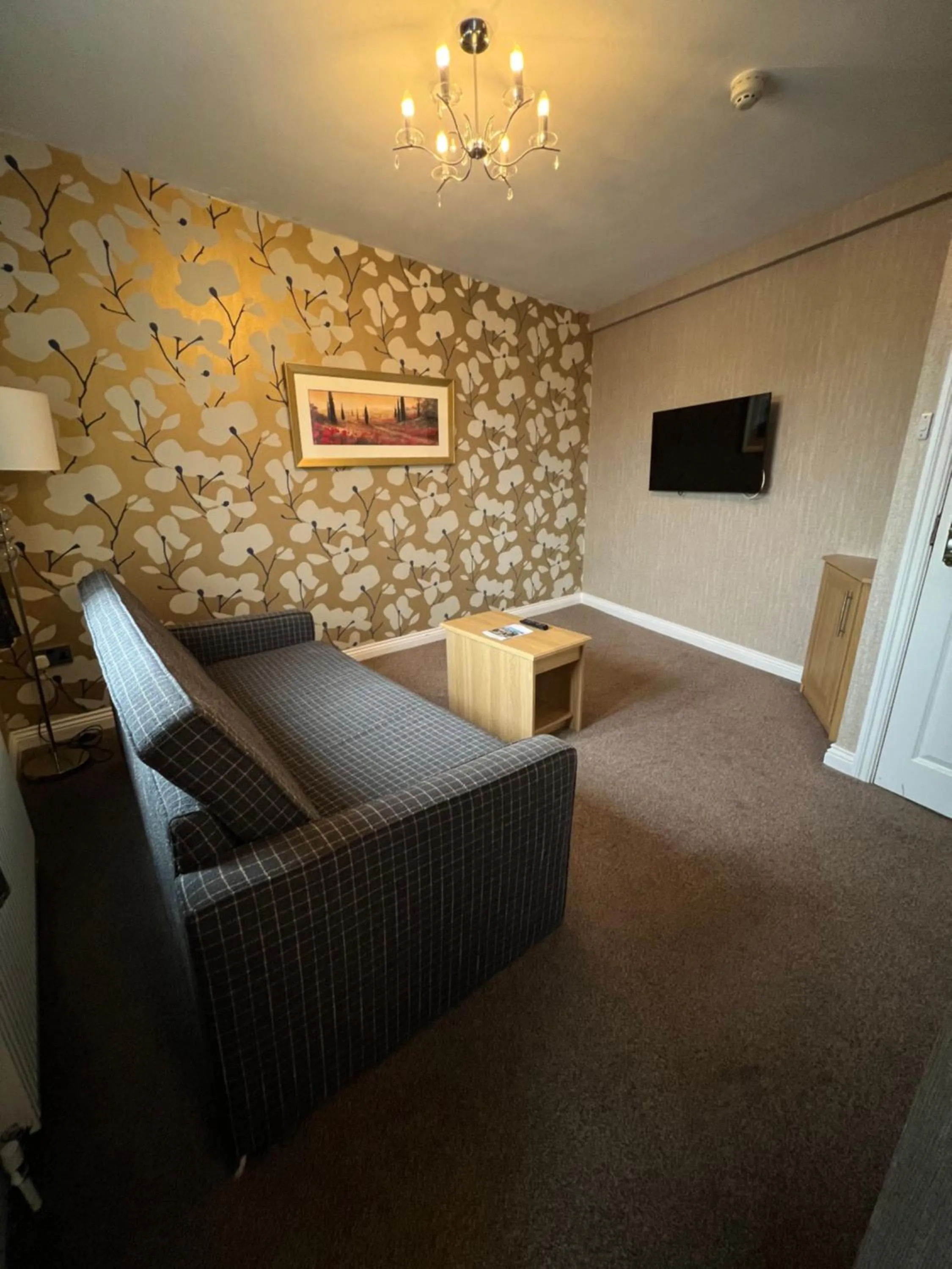 Seating area, Bed in Stirk House Hotel