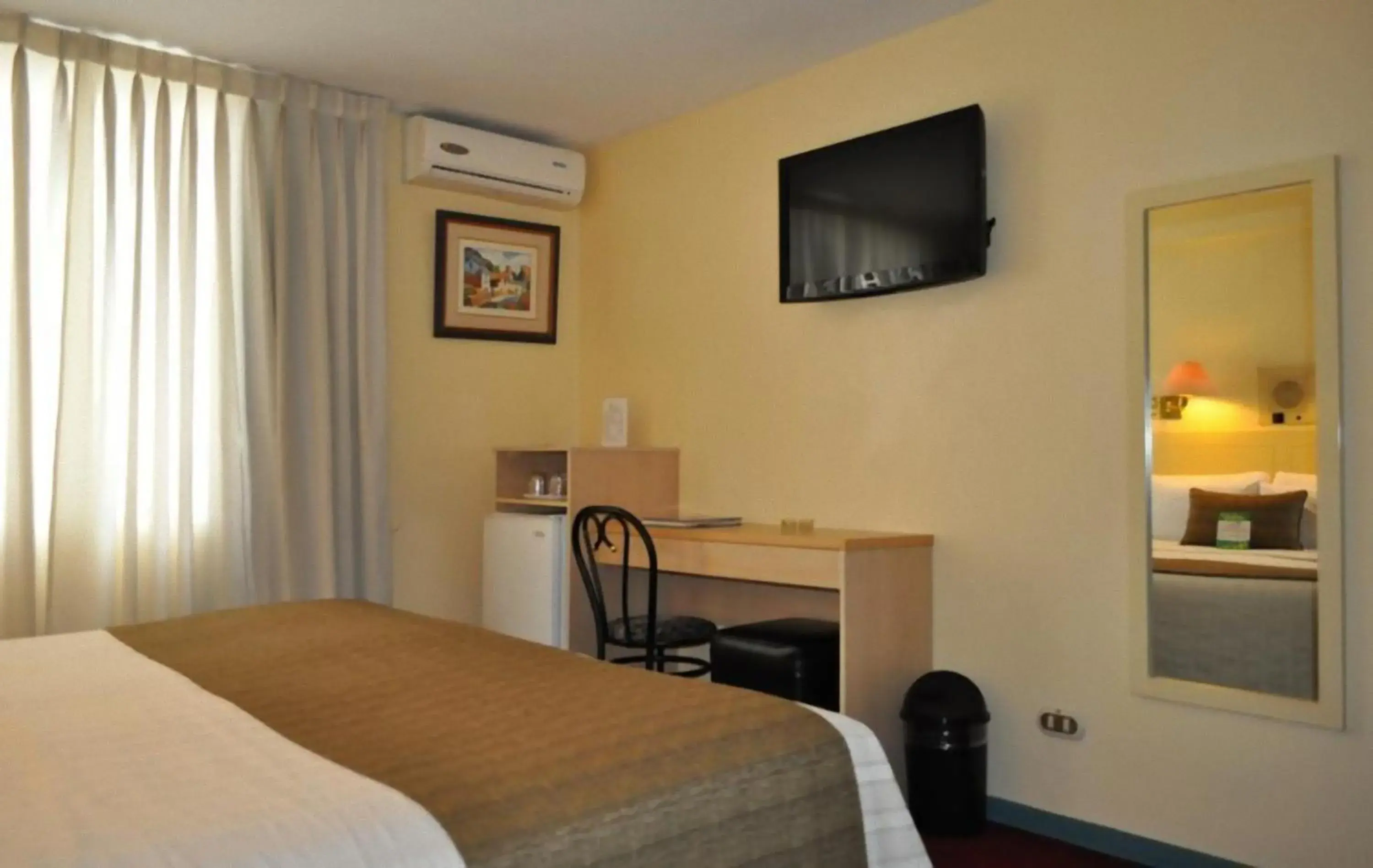 TV and multimedia, Bed in Embajadores Hotel TV and multimedia, Bed in Embajadores Hotel