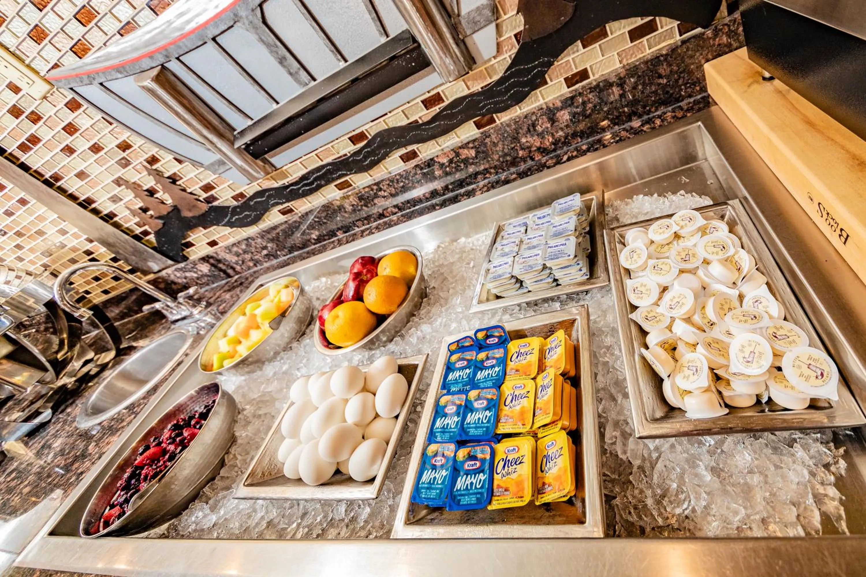 Buffet breakfast in Service Plus Inns and Suites Calgary