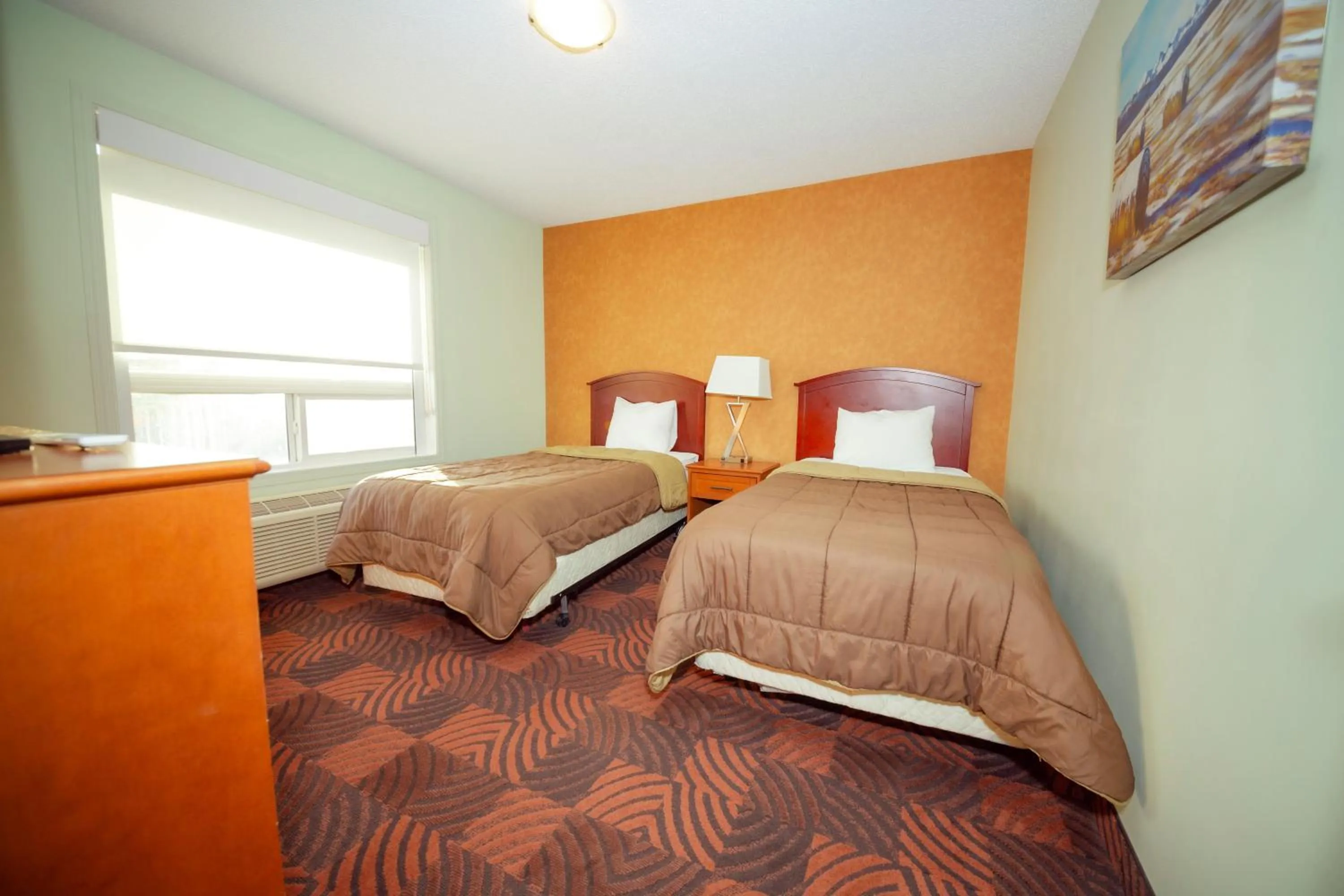 Bed in Service Plus Inns and Suites Calgary