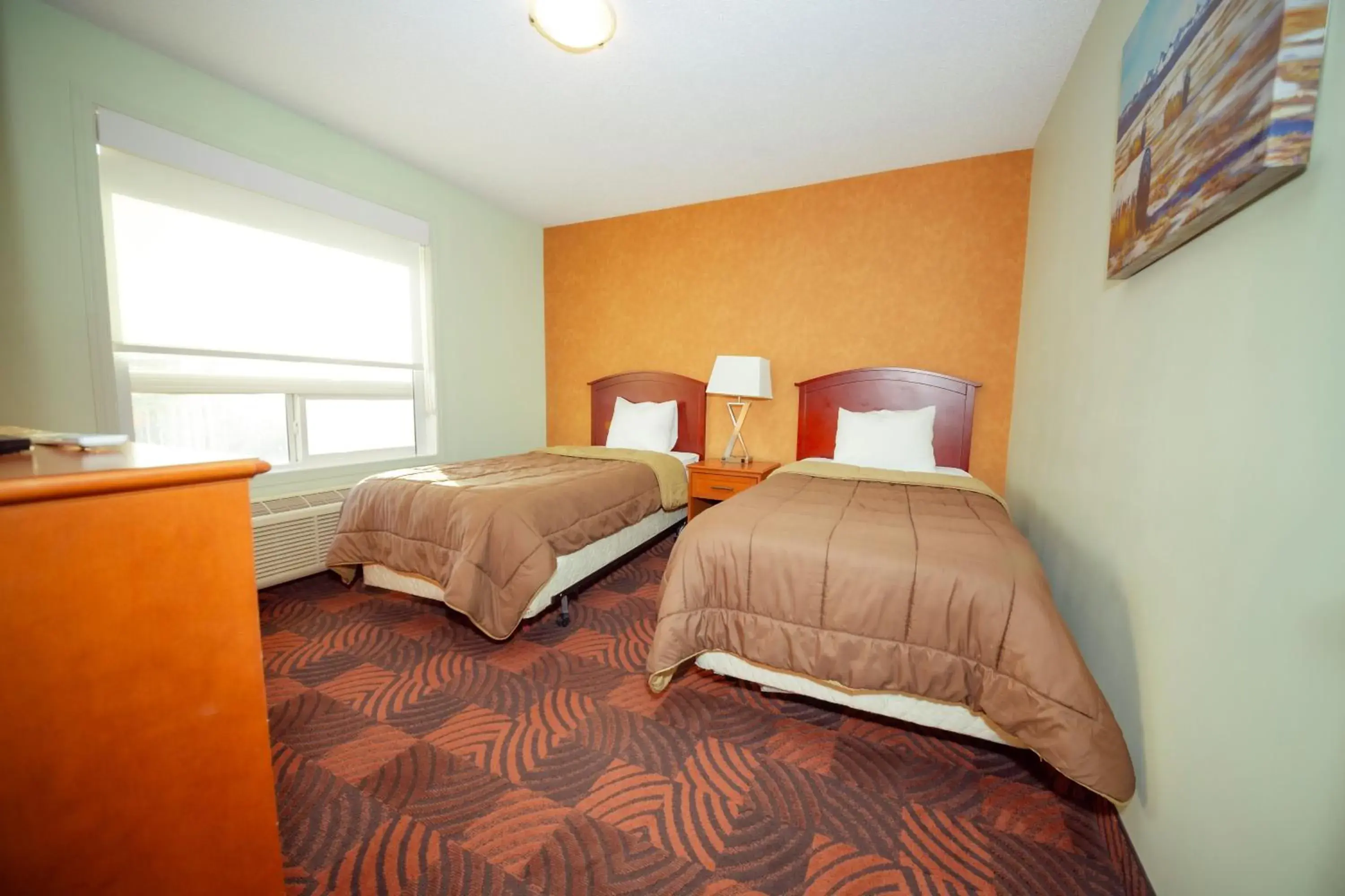 Bed in Service Plus Inns and Suites Calgary Bed in Service Plus Inns and Suites Calgary