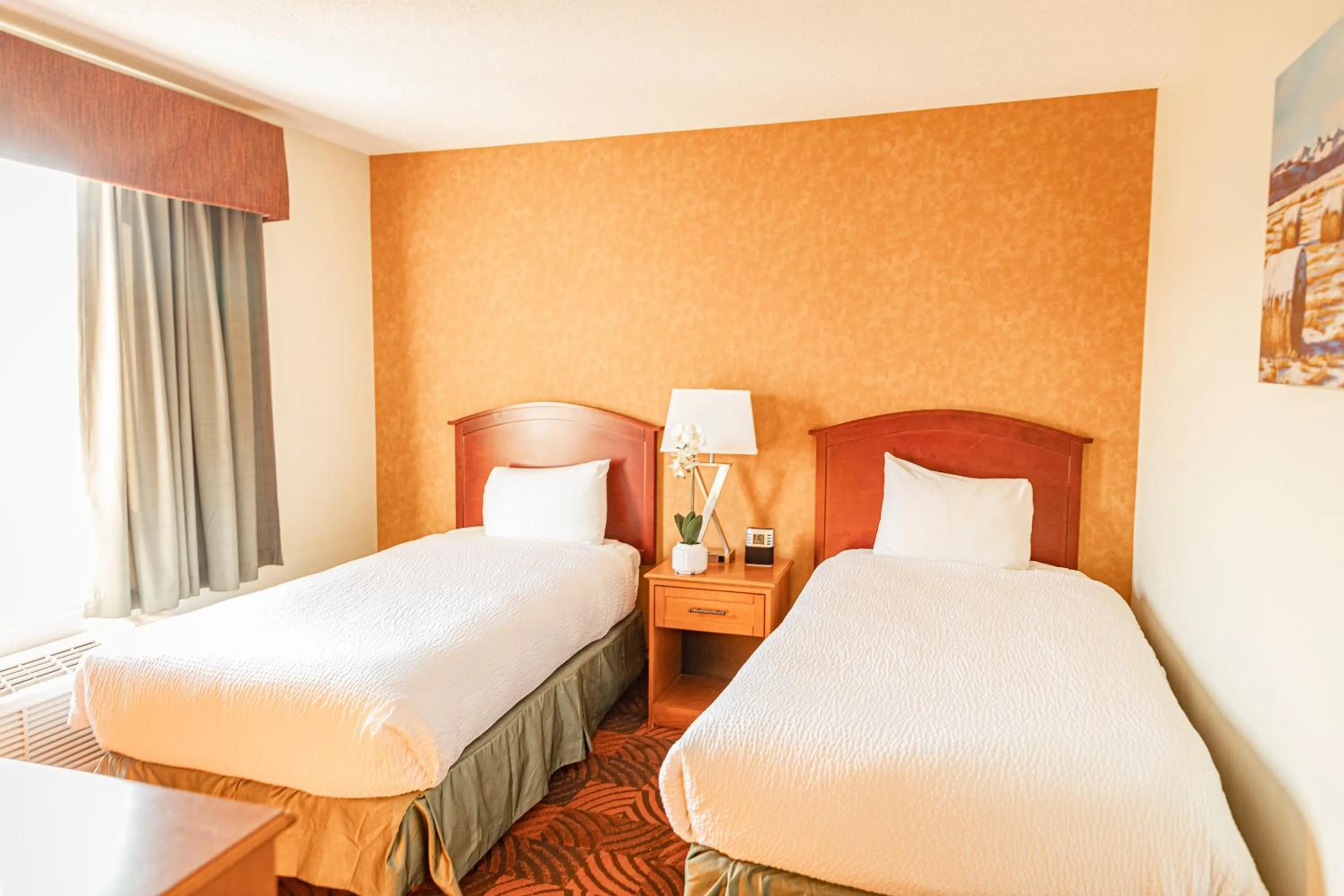 Bed in Service Plus Inns and Suites Calgary