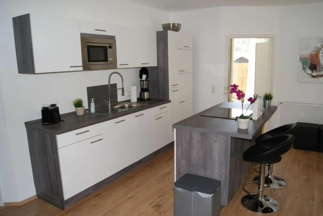 Kitchen or kitchenette in Ferienwohnungen TalBach