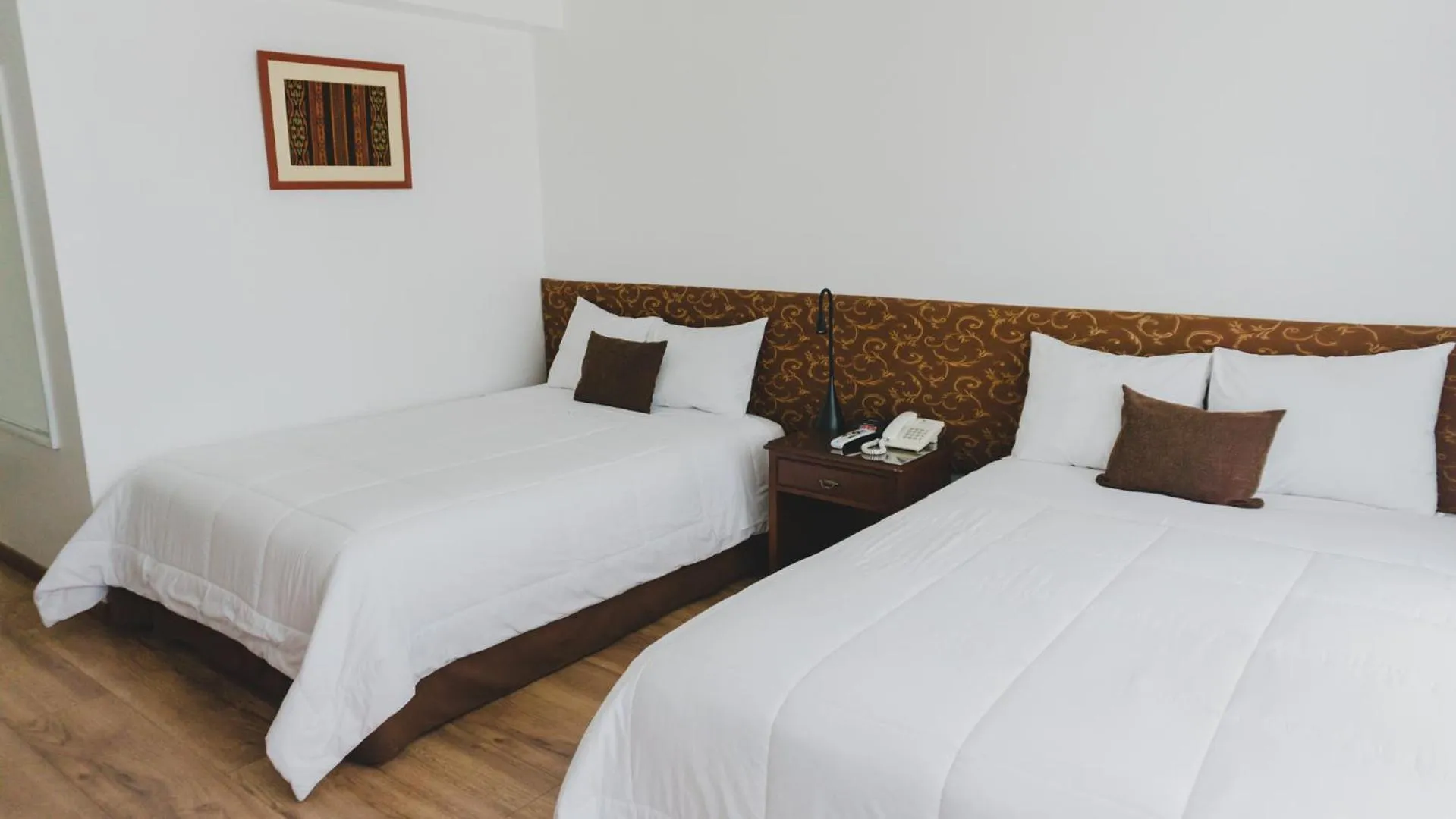 Bed in Faraona Grand Hotel