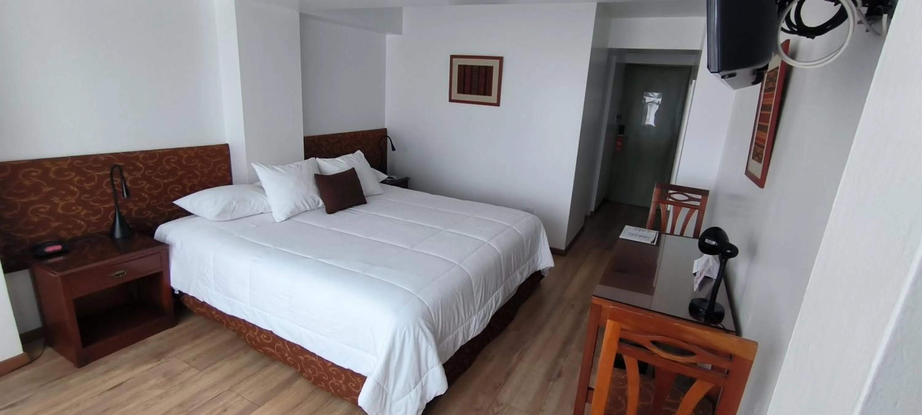 Bed in Faraona Grand Hotel