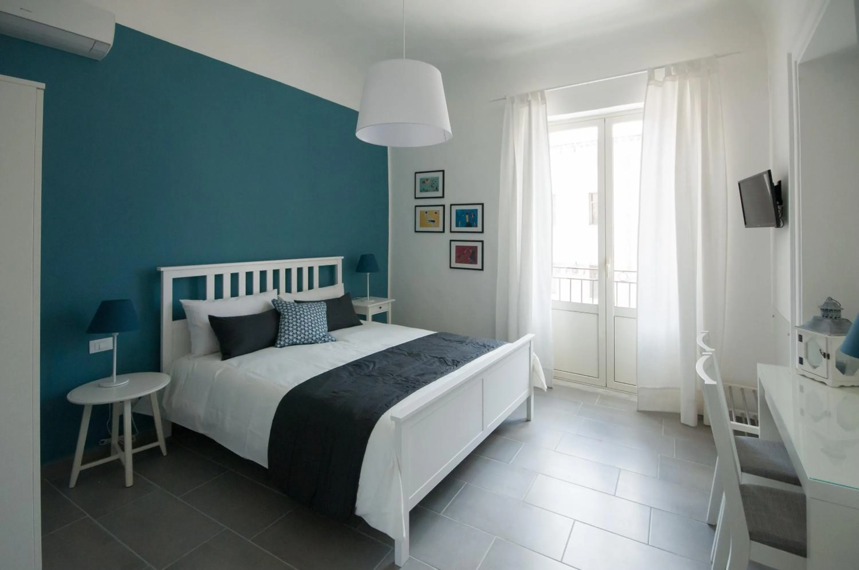 Triple Room with Balcony - single occupancy in Dietro il Teatro