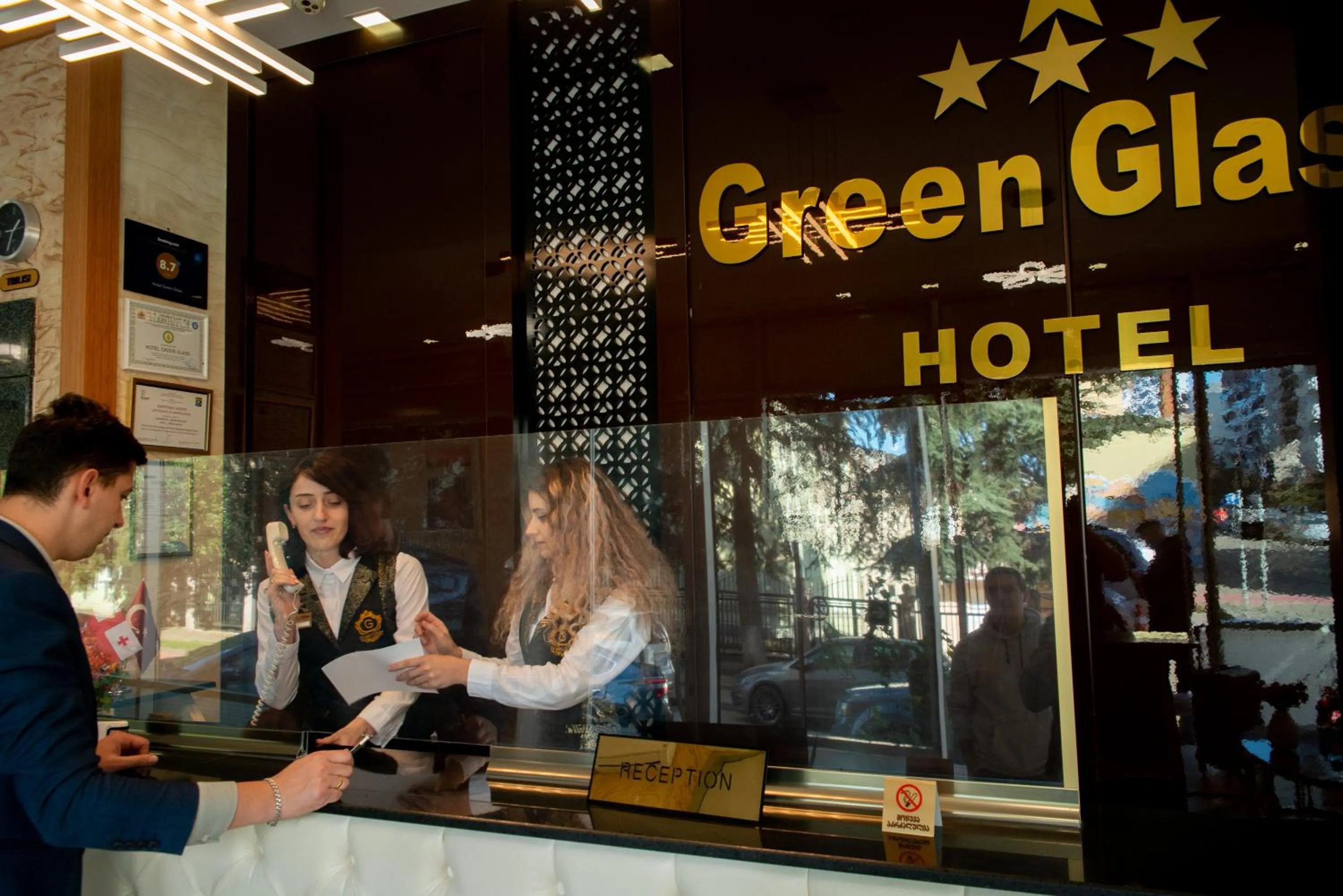 Staff in Hotel Green Glass