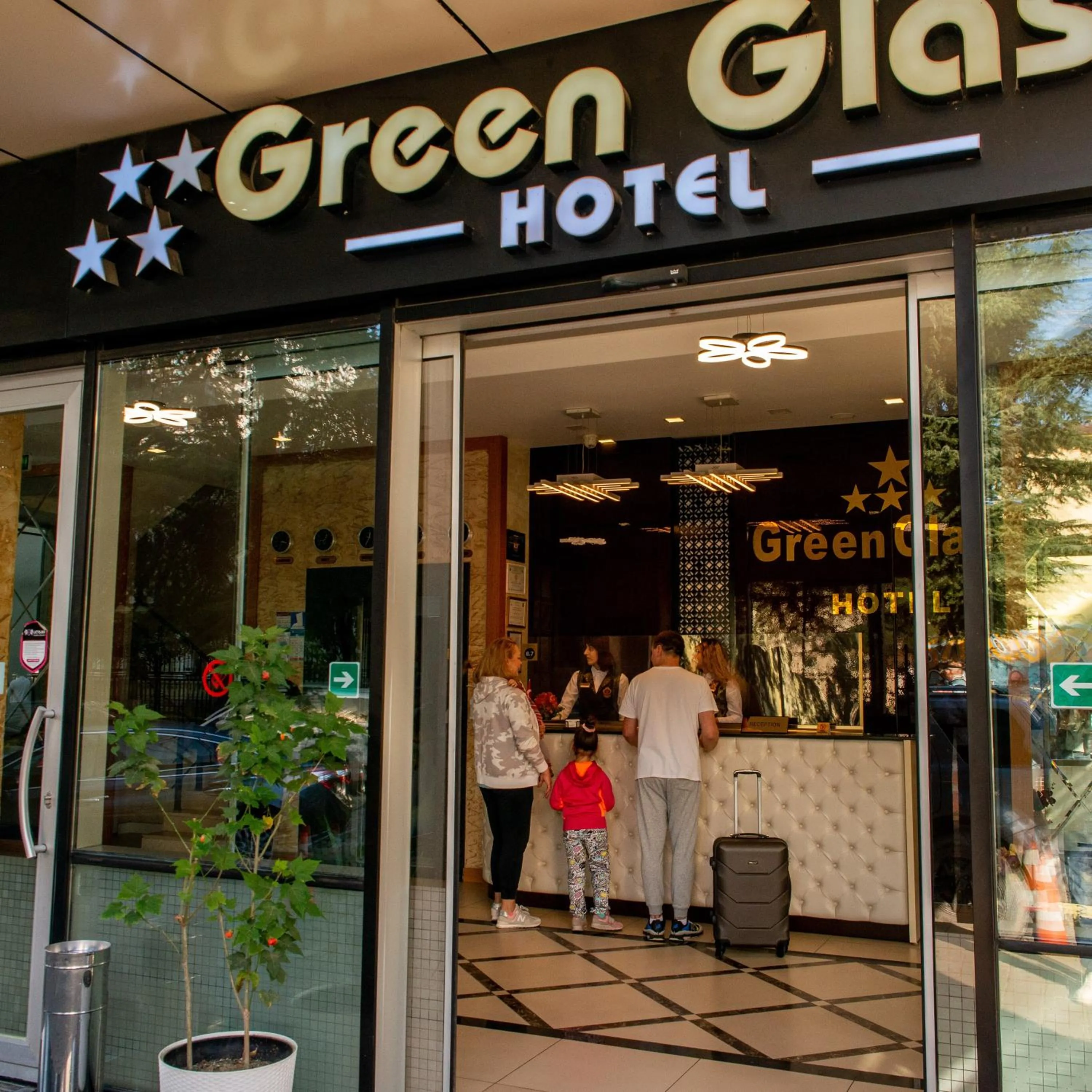 People in Hotel Green Glass