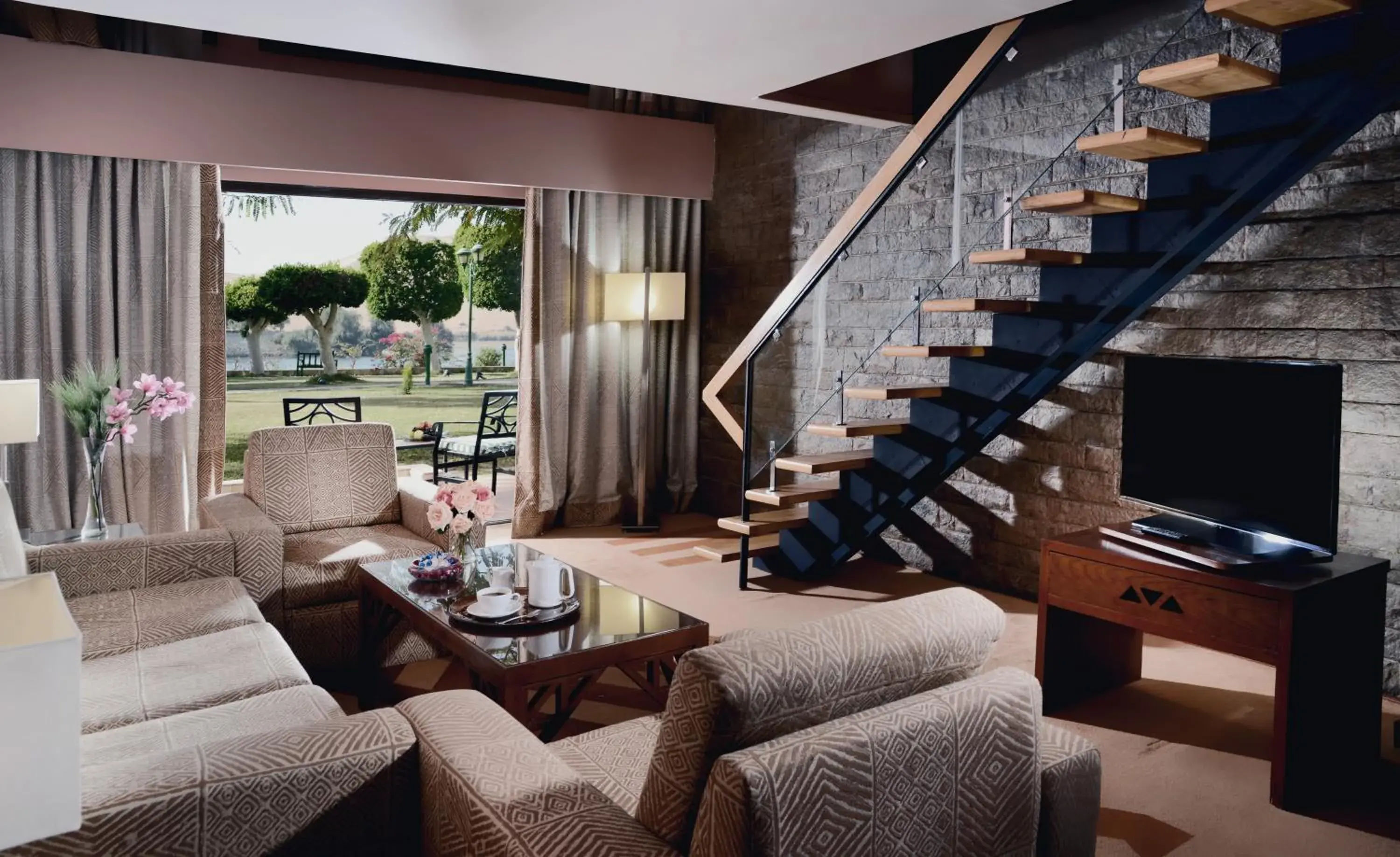 Living room in Mövenpick Resort Aswan Living room in Mövenpick Resort Aswan