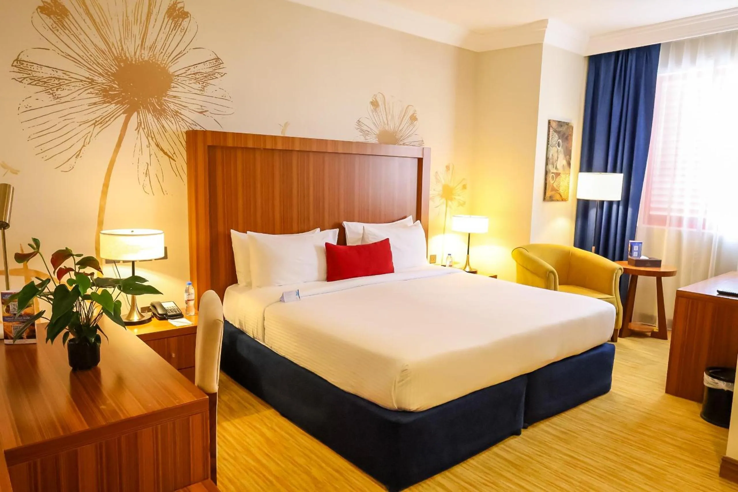 Bed in City Seasons Al Hamra Hotel