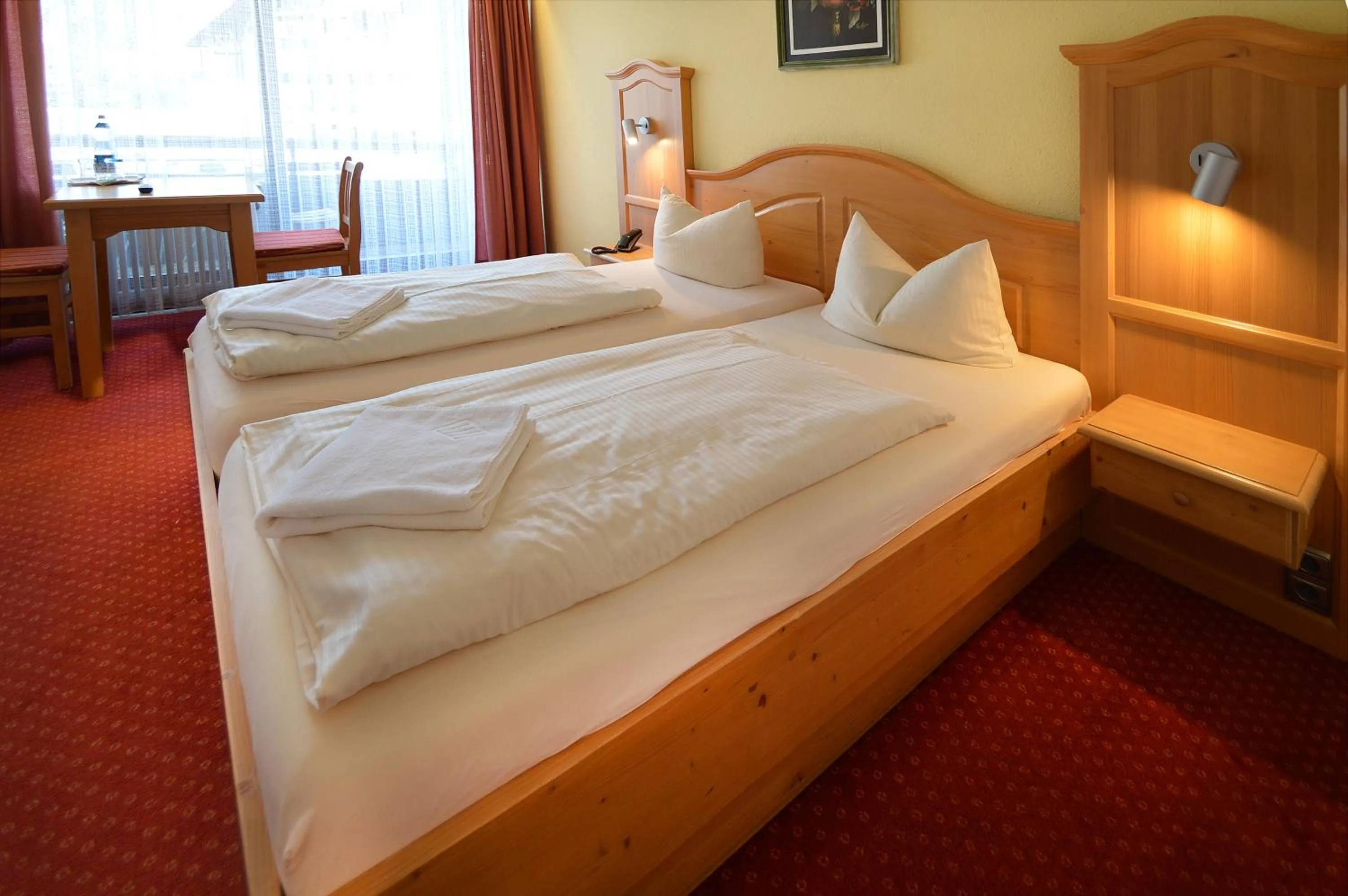 Photo of the whole room, Bed in Gasthof Hotel zur Post