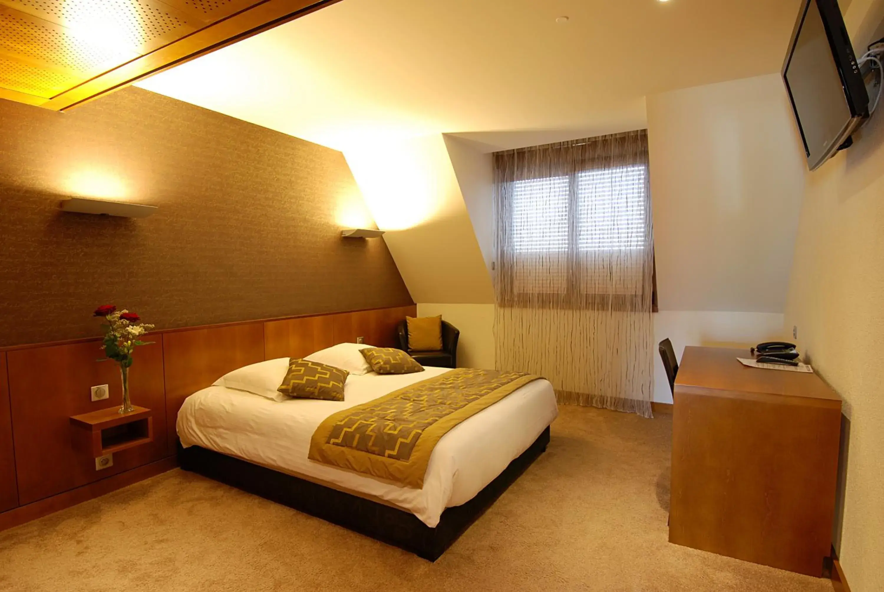 Quadruple Room in Hotel Au Nid De Cigognes Quadruple Room in Hotel Au Nid De Cigognes