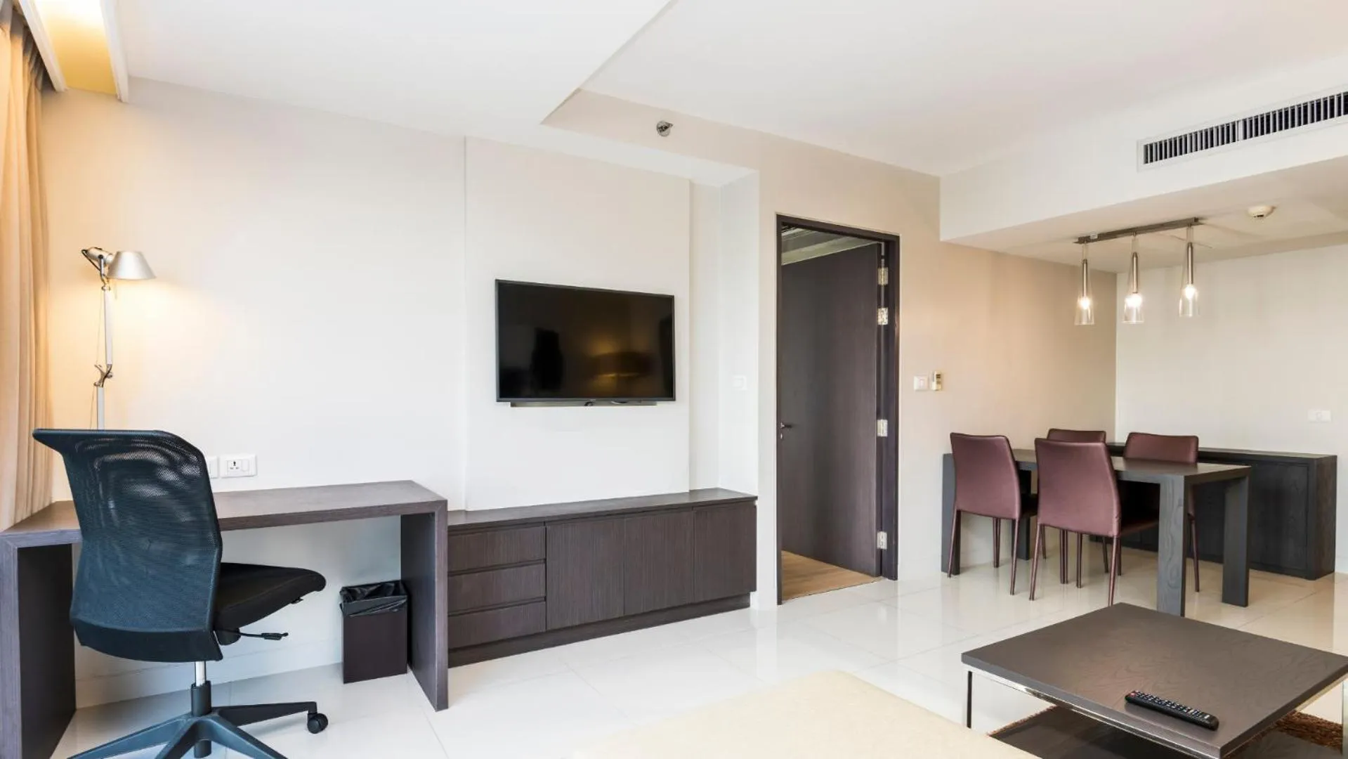 Living room in Maitria Hotel Sukhumvit 18 Bangkok – A Chatrium Collection