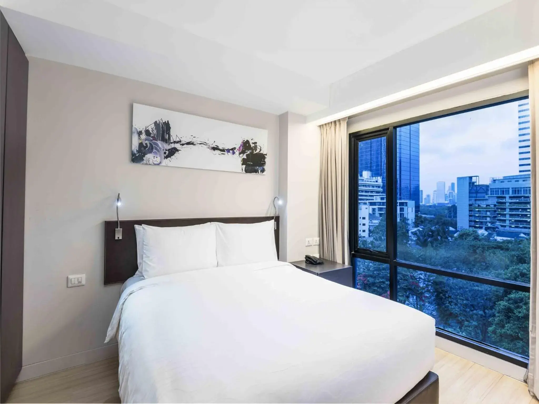 View (from property/room), Bed in Maitria Hotel Sukhumvit 18 Bangkok – A Chatrium Collection View (from property/room), Bed in Maitria Hotel Sukhumvit 18 Bangkok – A Chatrium Collection