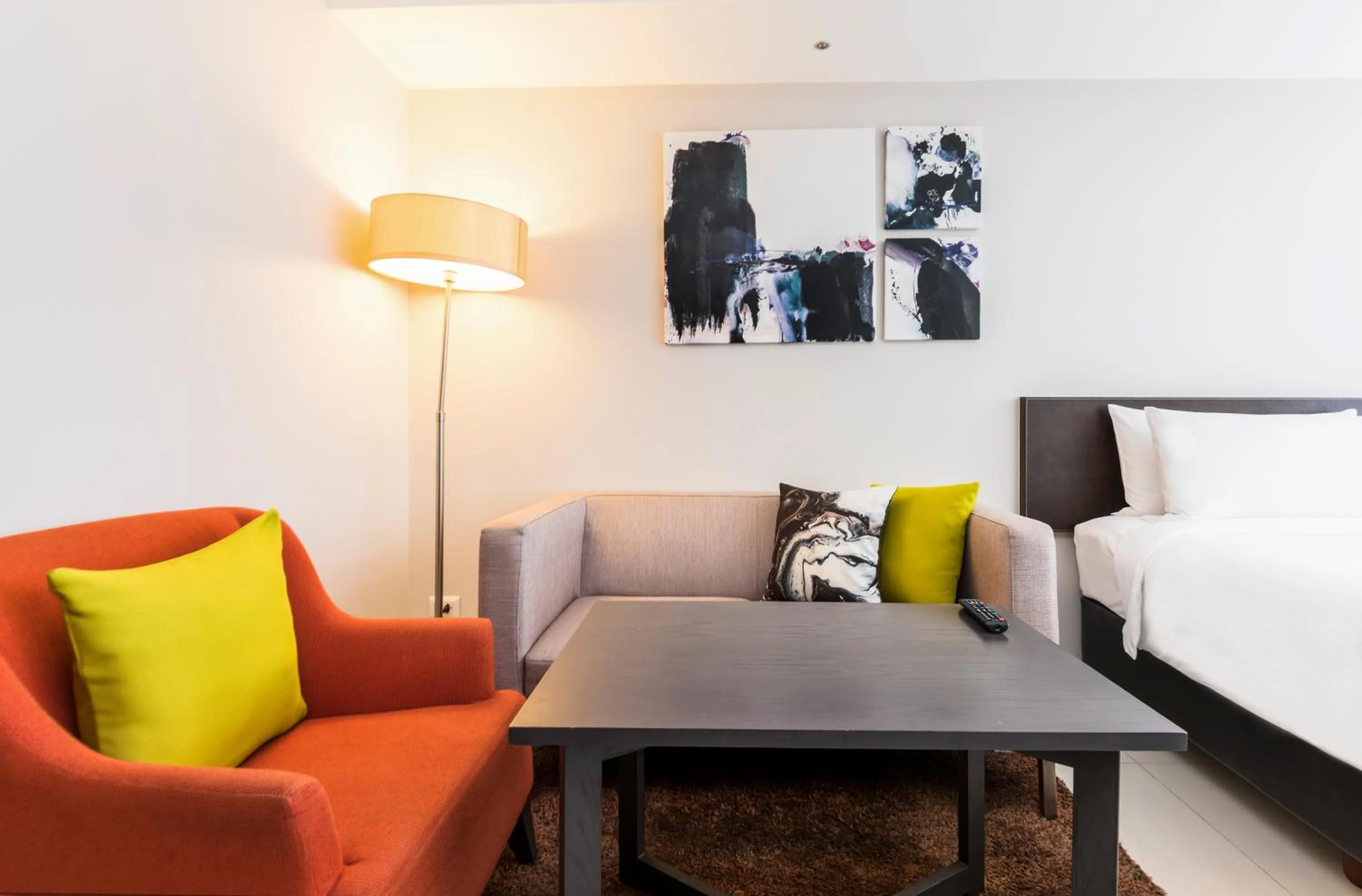 Seating area, Bed in Maitria Hotel Sukhumvit 18 Bangkok – A Chatrium Collection