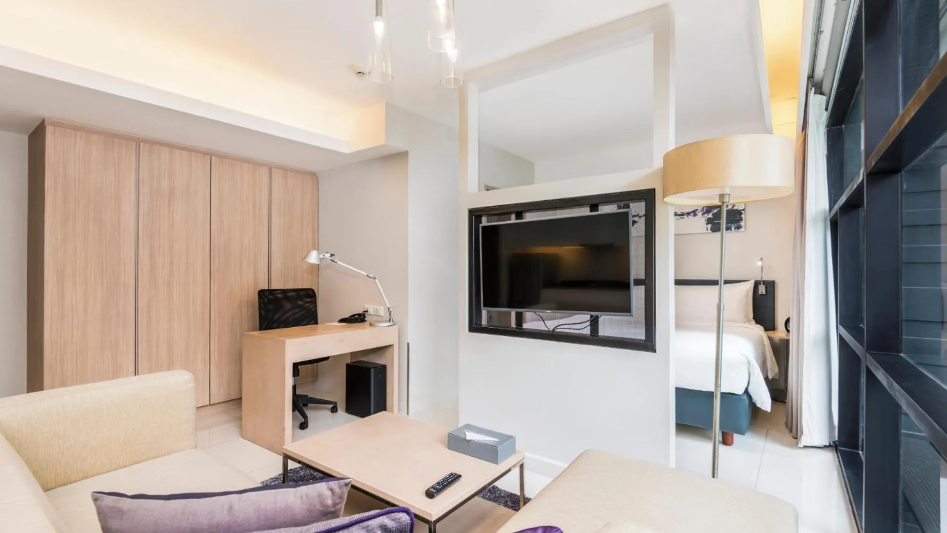 Living room in Maitria Hotel Sukhumvit 18 Bangkok – A Chatrium Collection