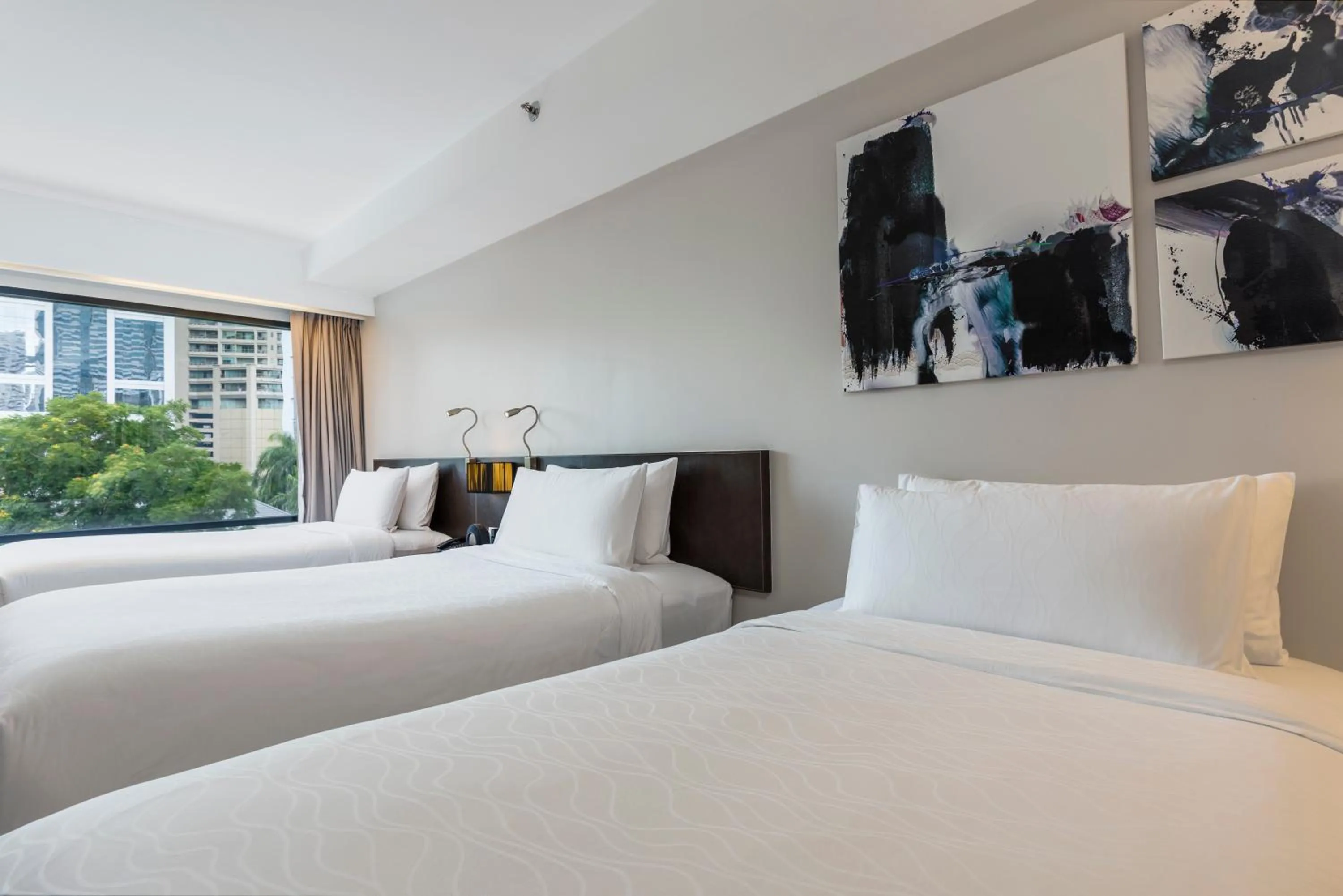 Bed in Maitria Hotel Sukhumvit 18 Bangkok – A Chatrium Collection