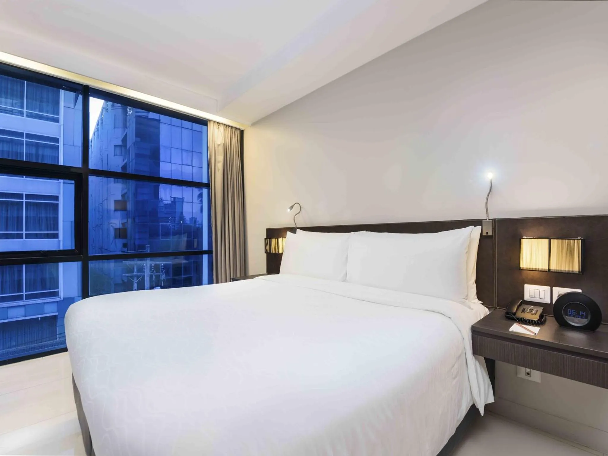 Bed in Maitria Hotel Sukhumvit 18 Bangkok – A Chatrium Collection