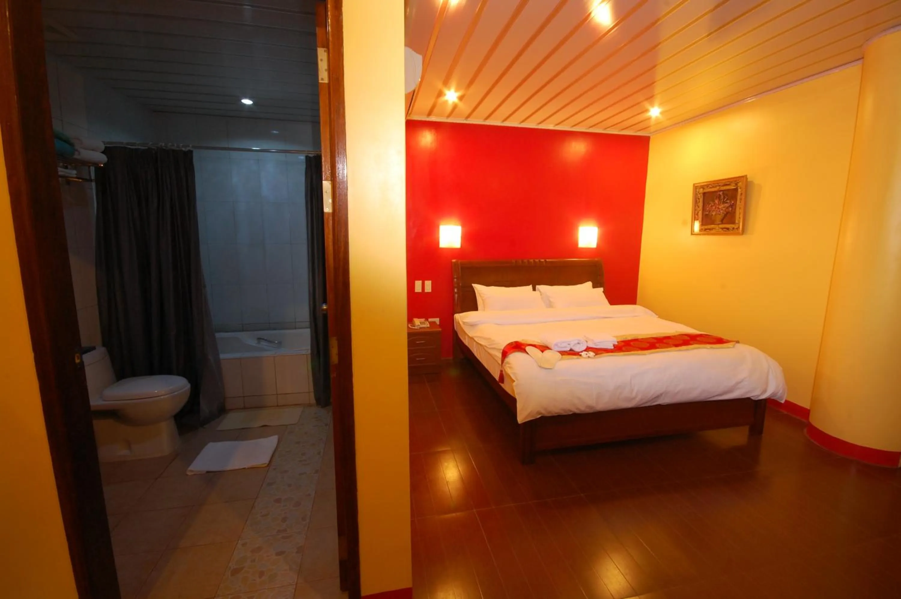 Bed in A&A Plaza Hotel