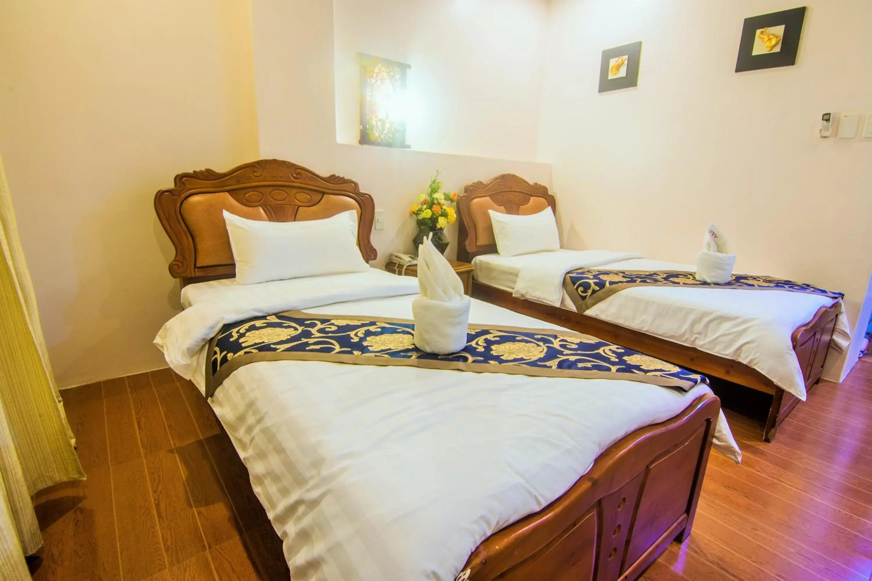 Bed in A&A Plaza Hotel Bed in A&A Plaza Hotel