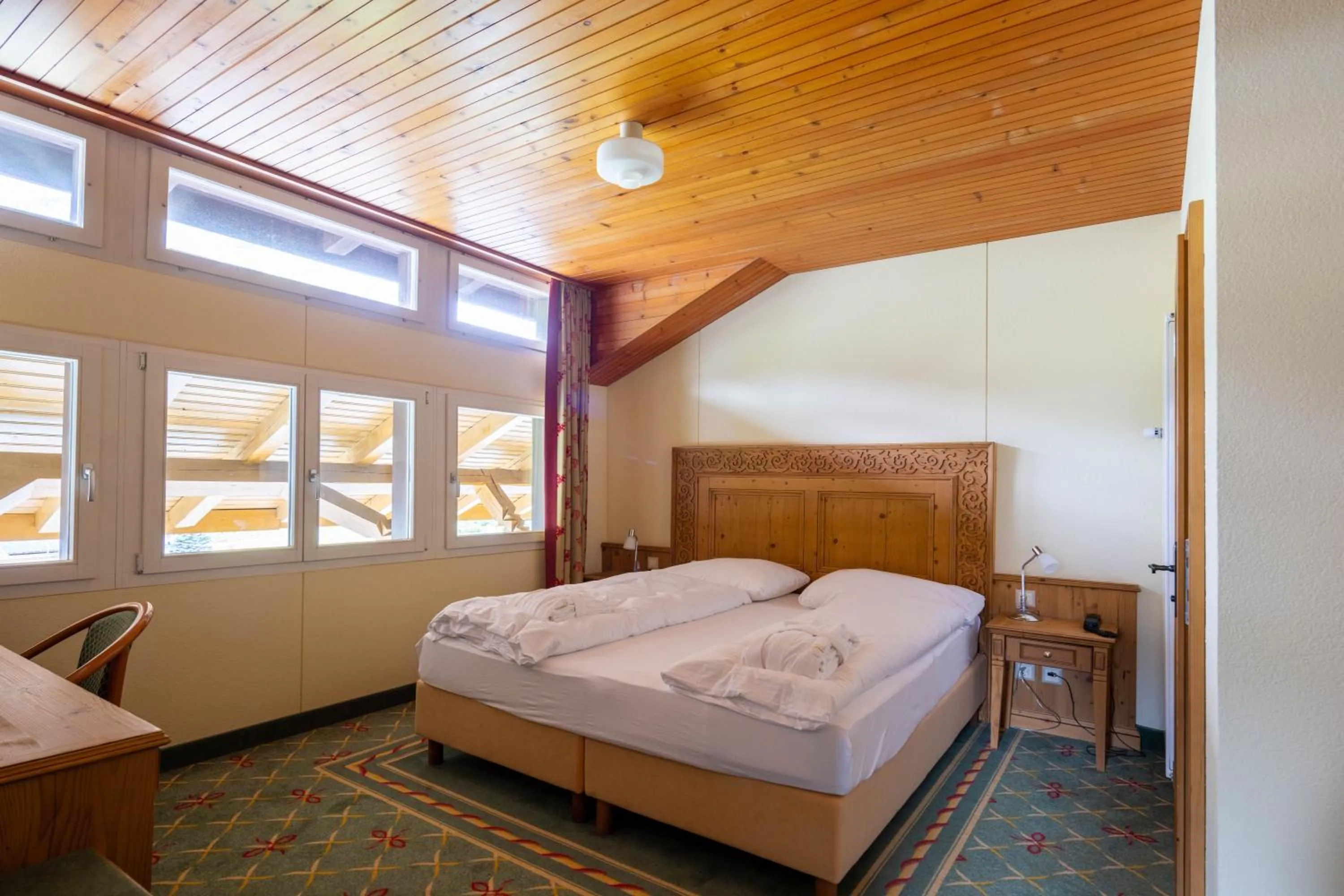 Photo of the whole room, Bed in Sporthotel Wildstrubel