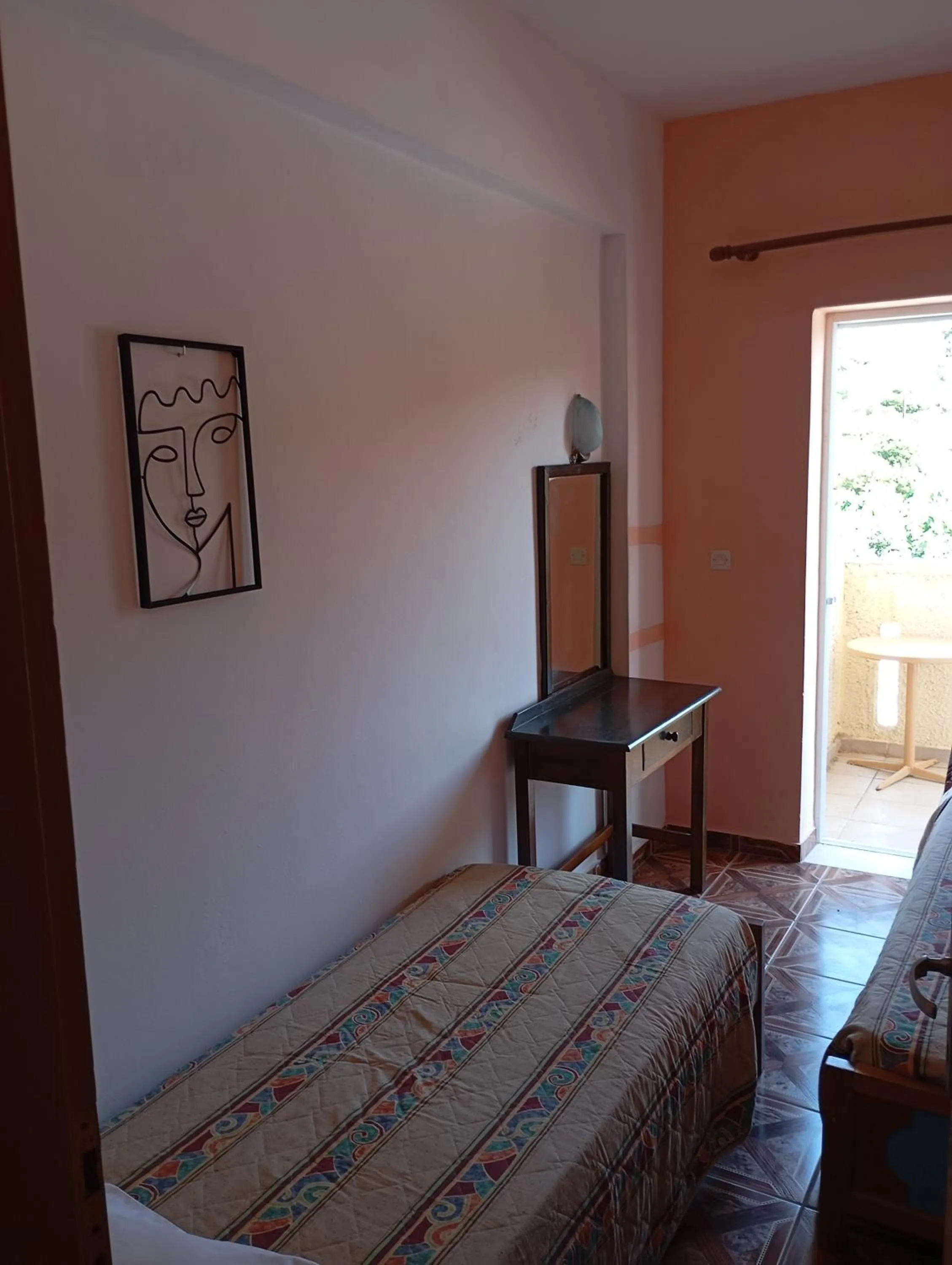 Bed in Denise Apartments Kefalos