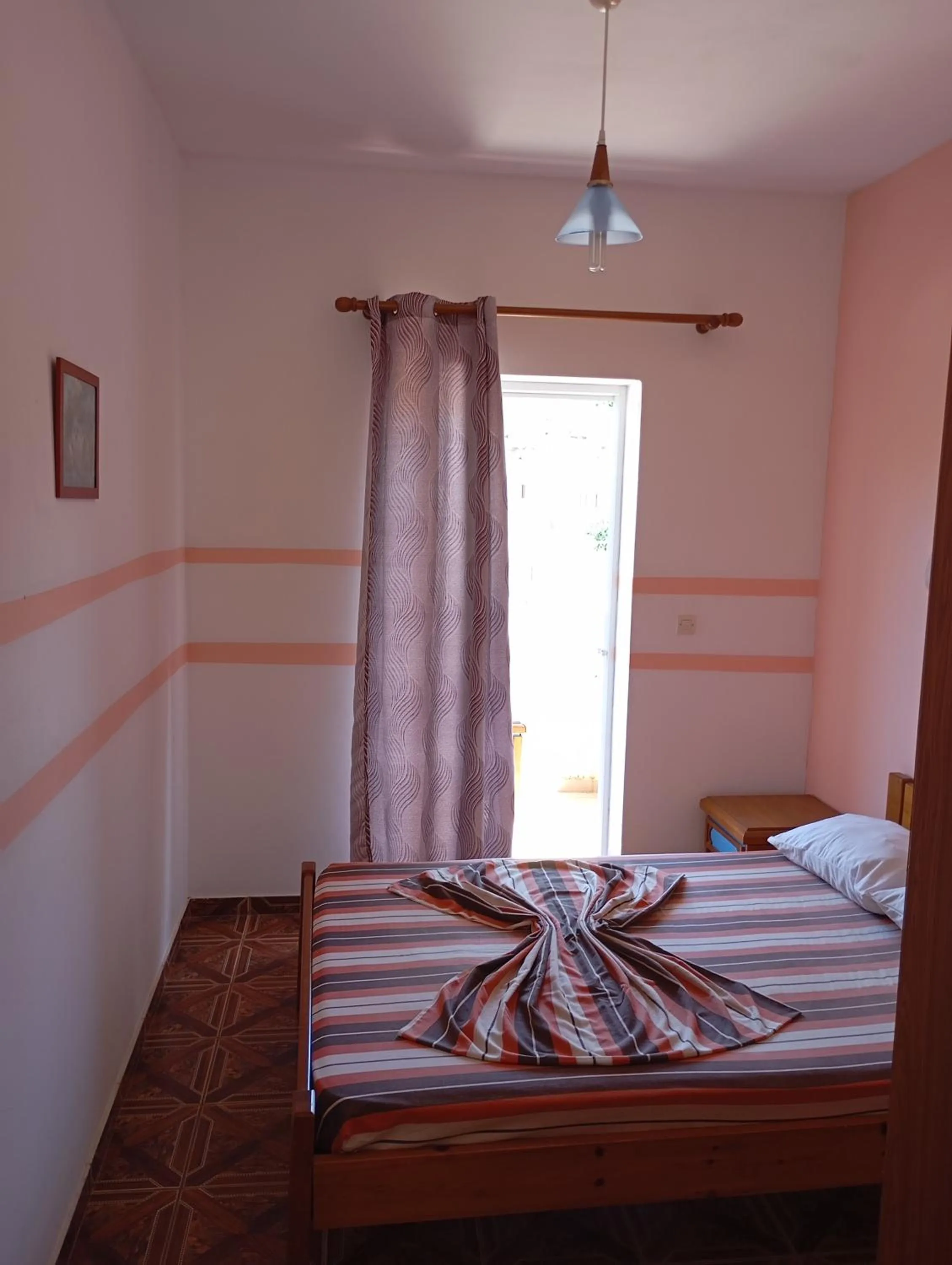 Bed in Denise Apartments Kefalos