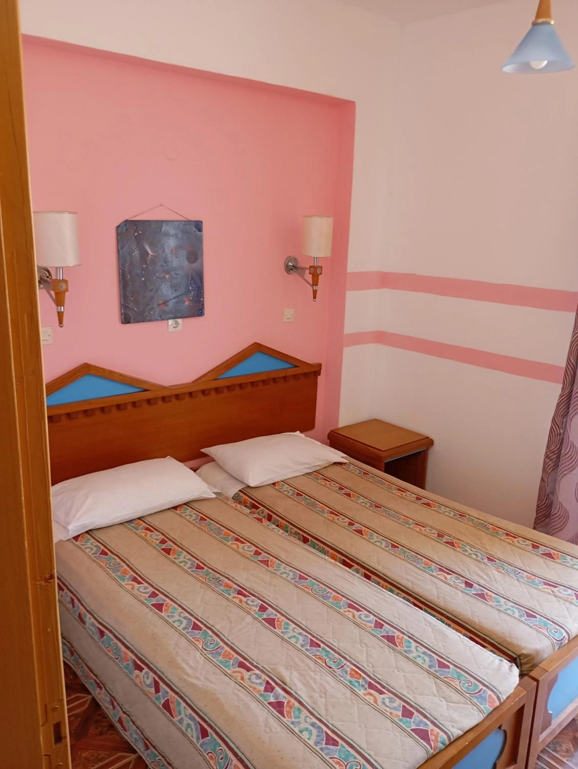 Bed in Denise Apartments Kefalos