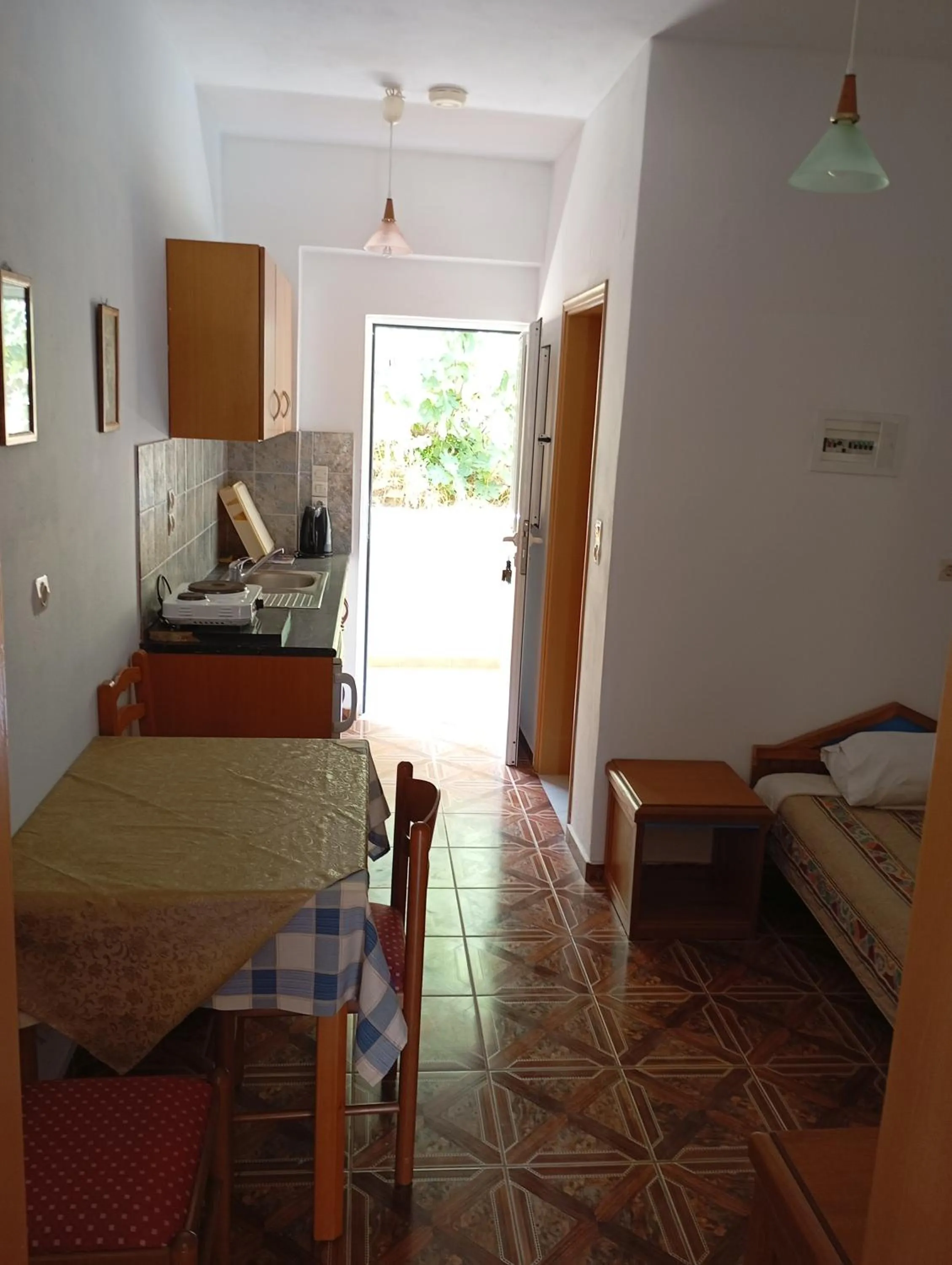 Bed in Denise Apartments Kefalos