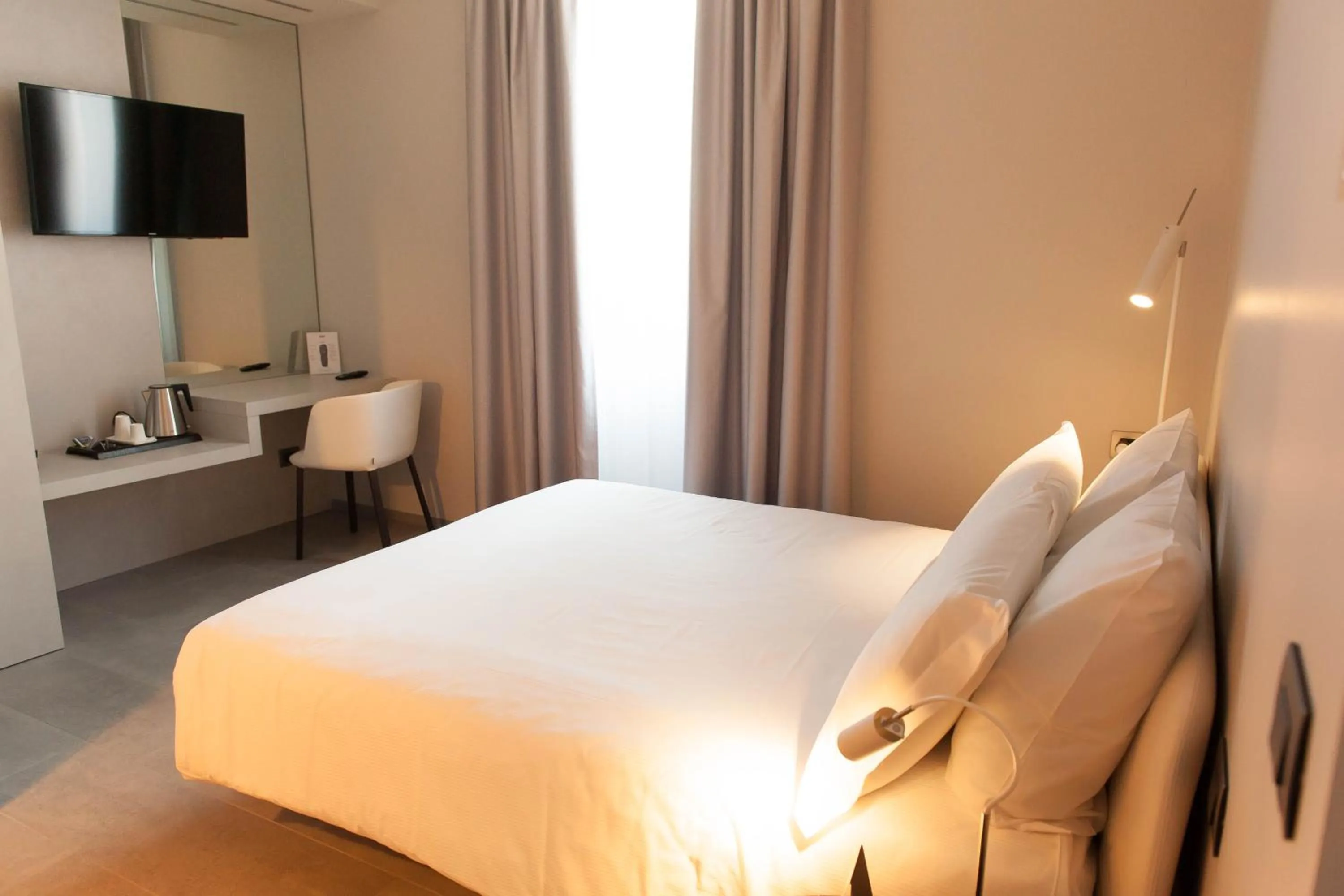 TV and multimedia, Bed in Le Funi Hotel