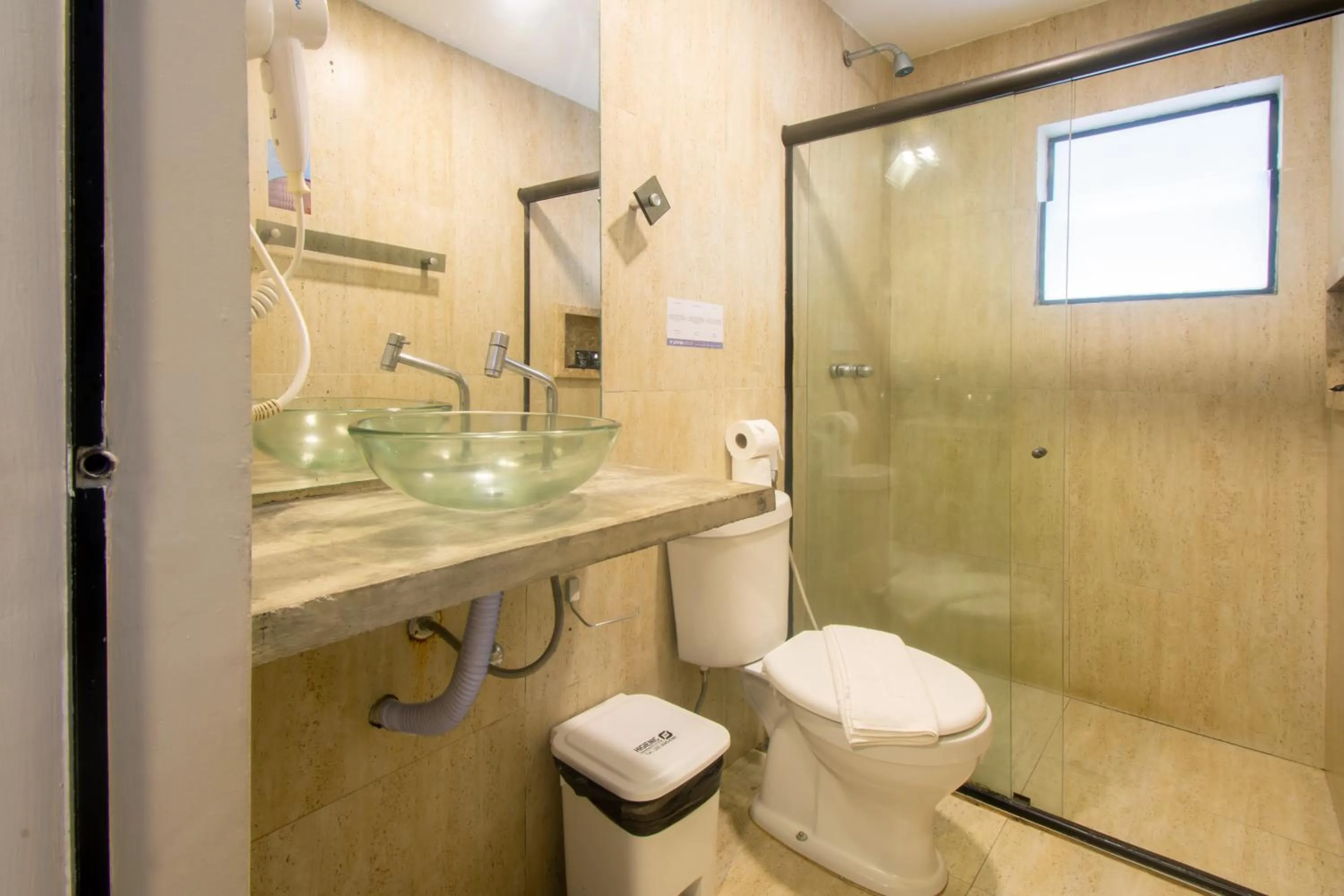 Shower in Hotel Barra da Lagoa by Latitud Hoteles