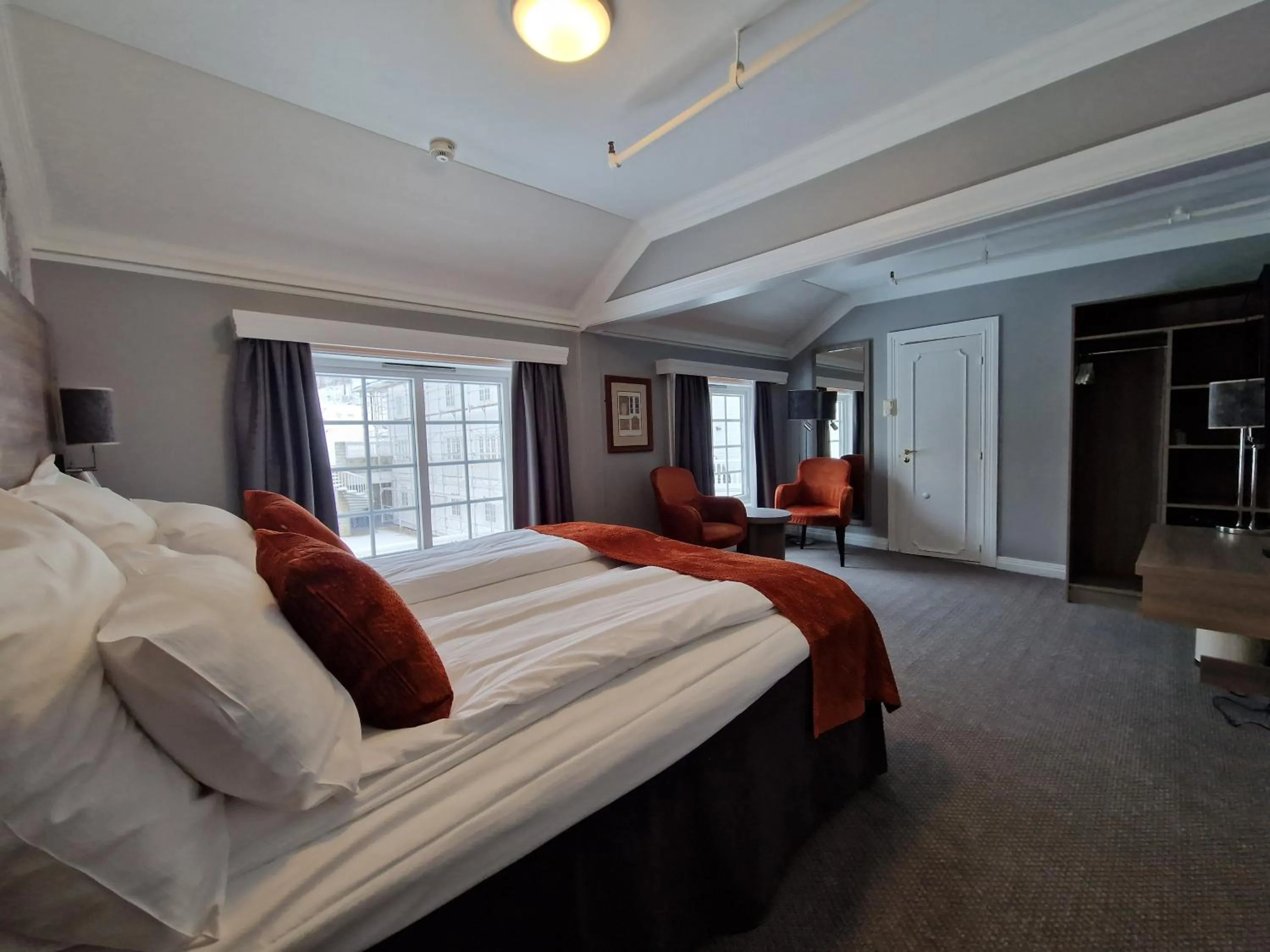 Bed in Dr. Holms Hotel