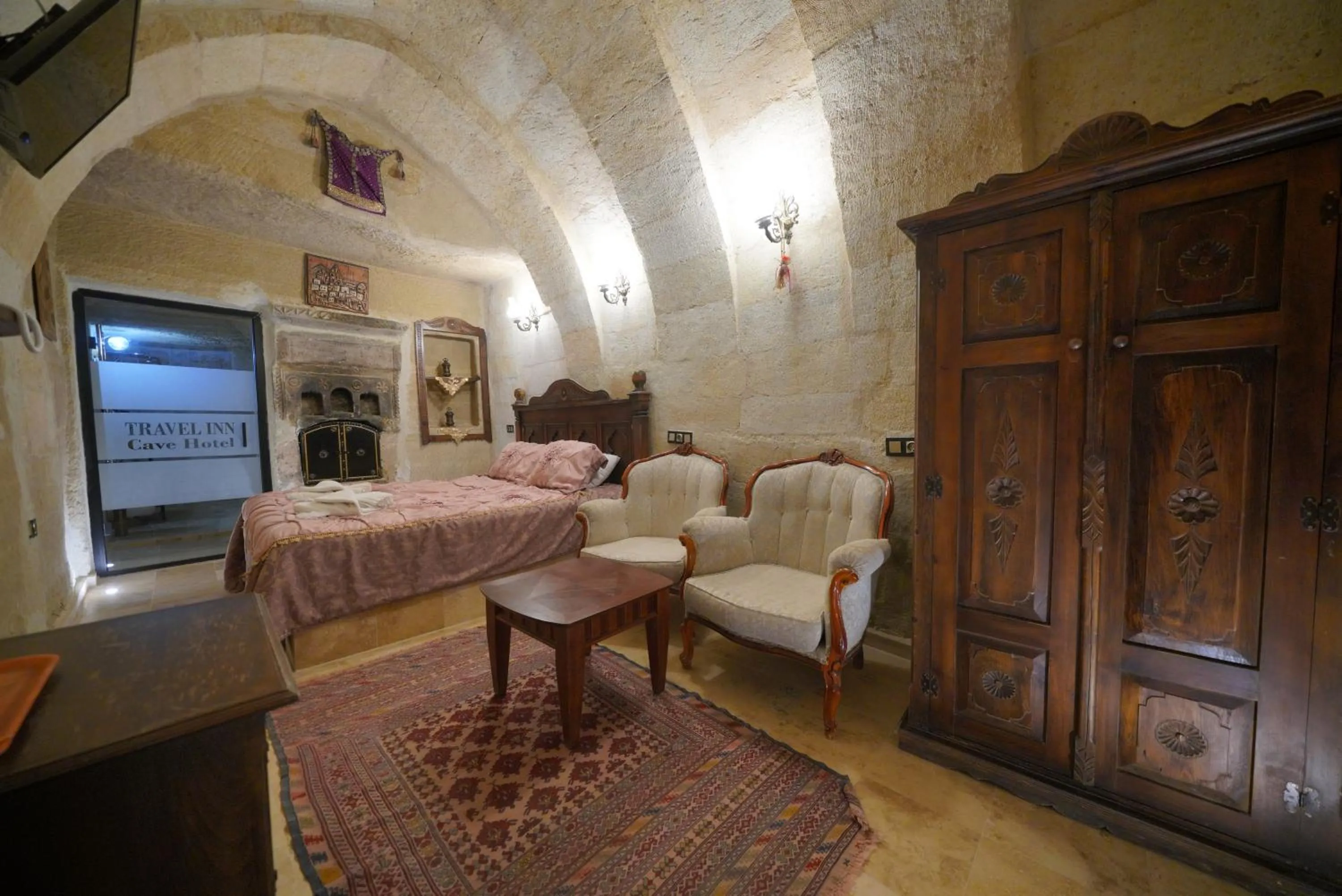 Bed in Travel Inn Cave Hotel