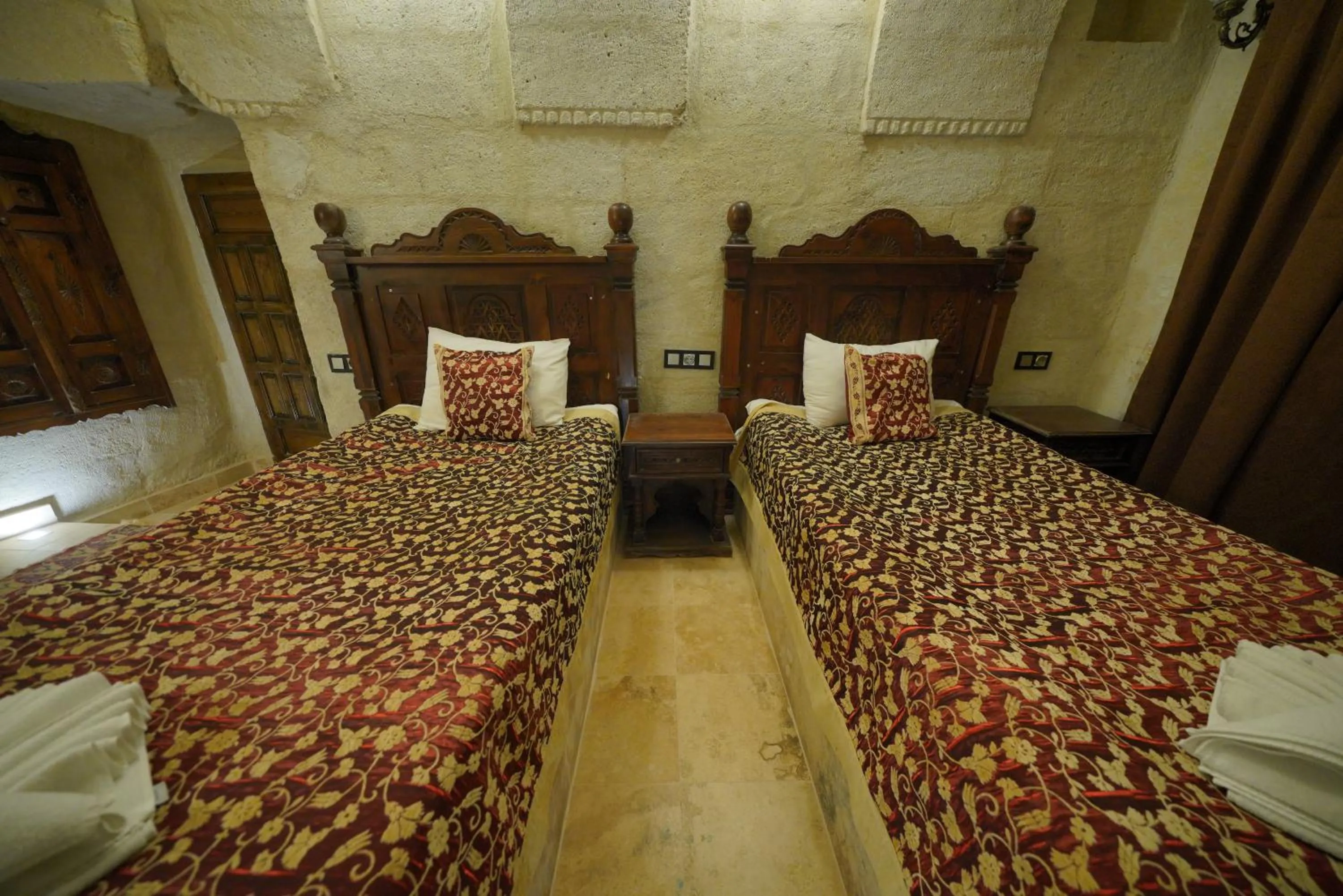 Bed in Travel Inn Cave Hotel