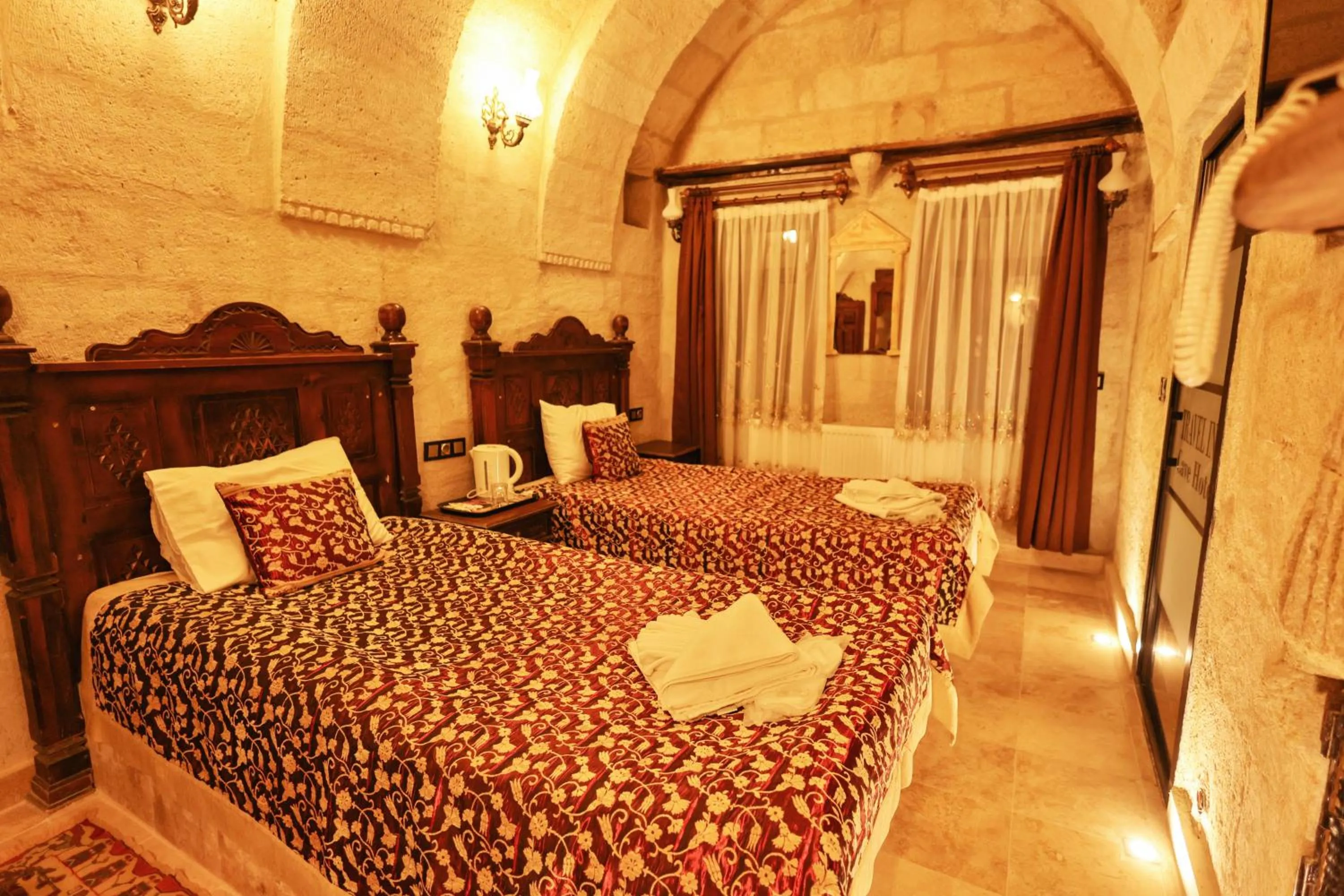 Bed in Travel Inn Cave Hotel