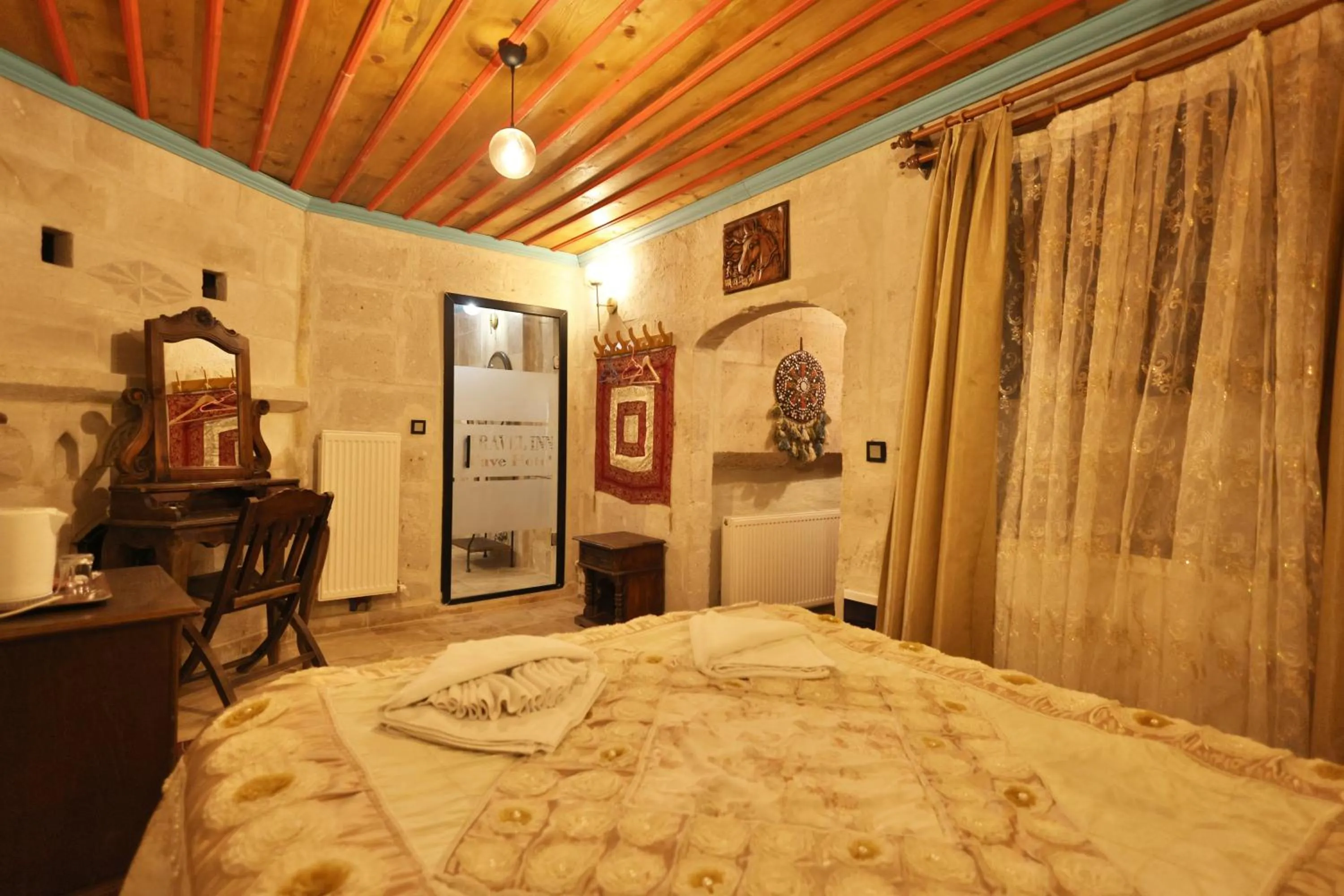 Bed in Travel Inn Cave Hotel