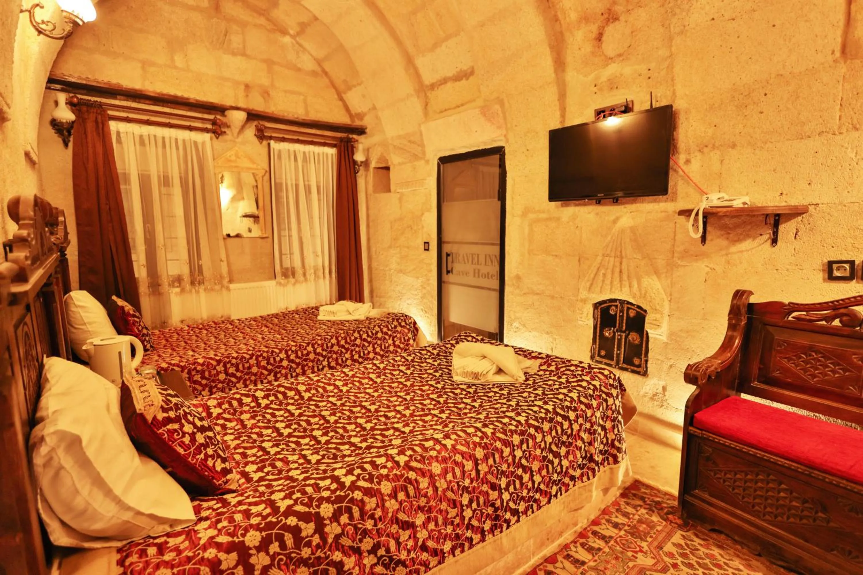 Bed in Travel Inn Cave Hotel