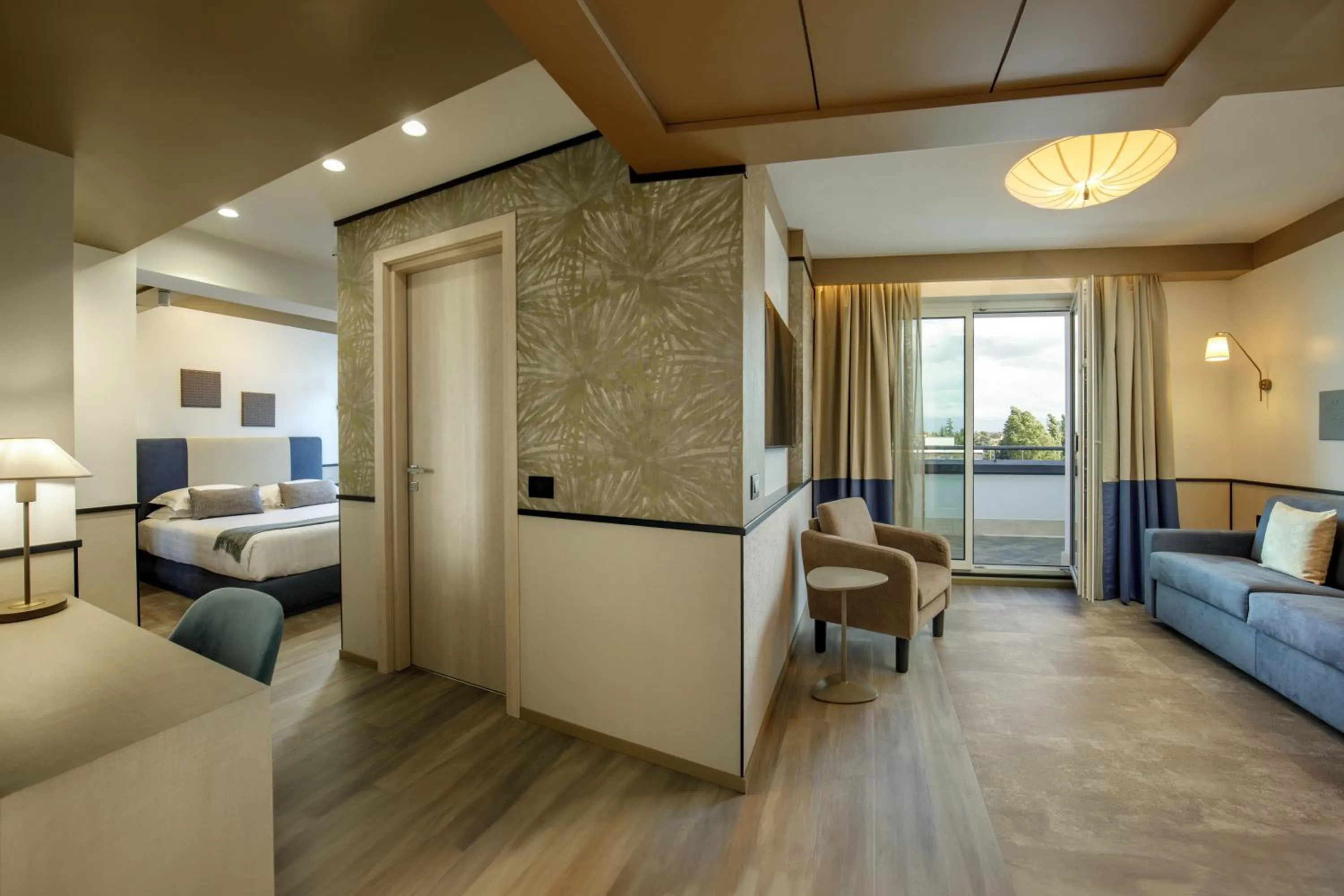 Living room, Bed in Hotel Domidea