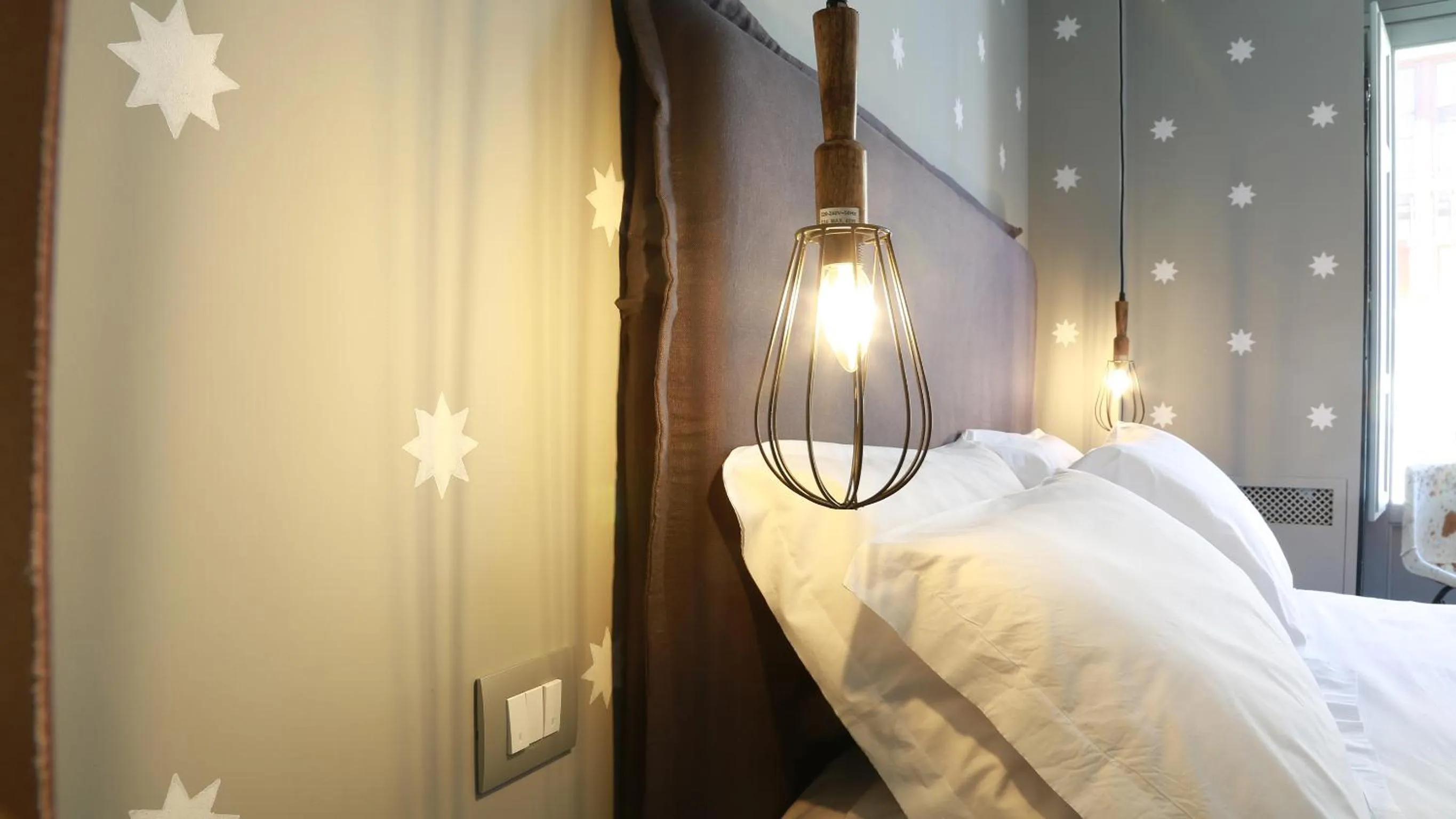 Bed in Intervallo Boutique Hotel