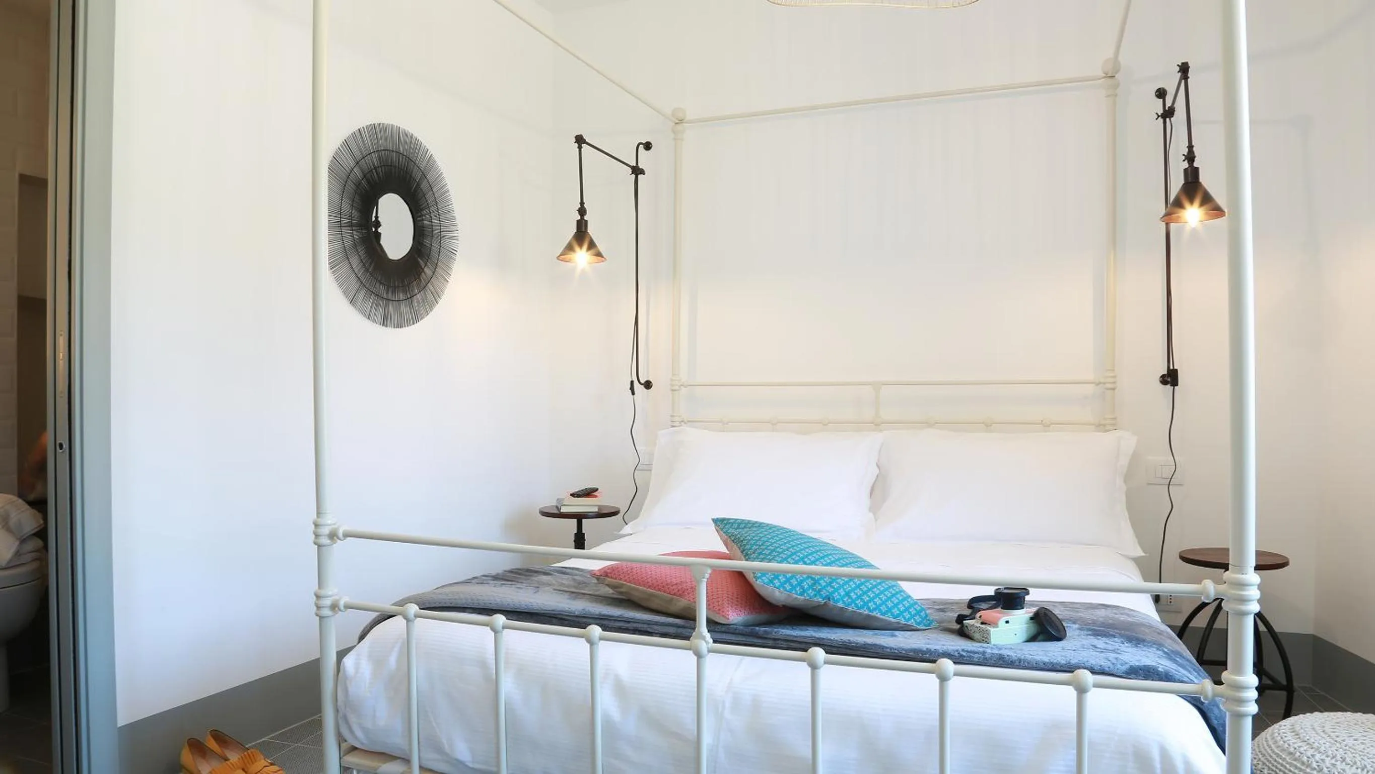 Bed in Intervallo Boutique Hotel