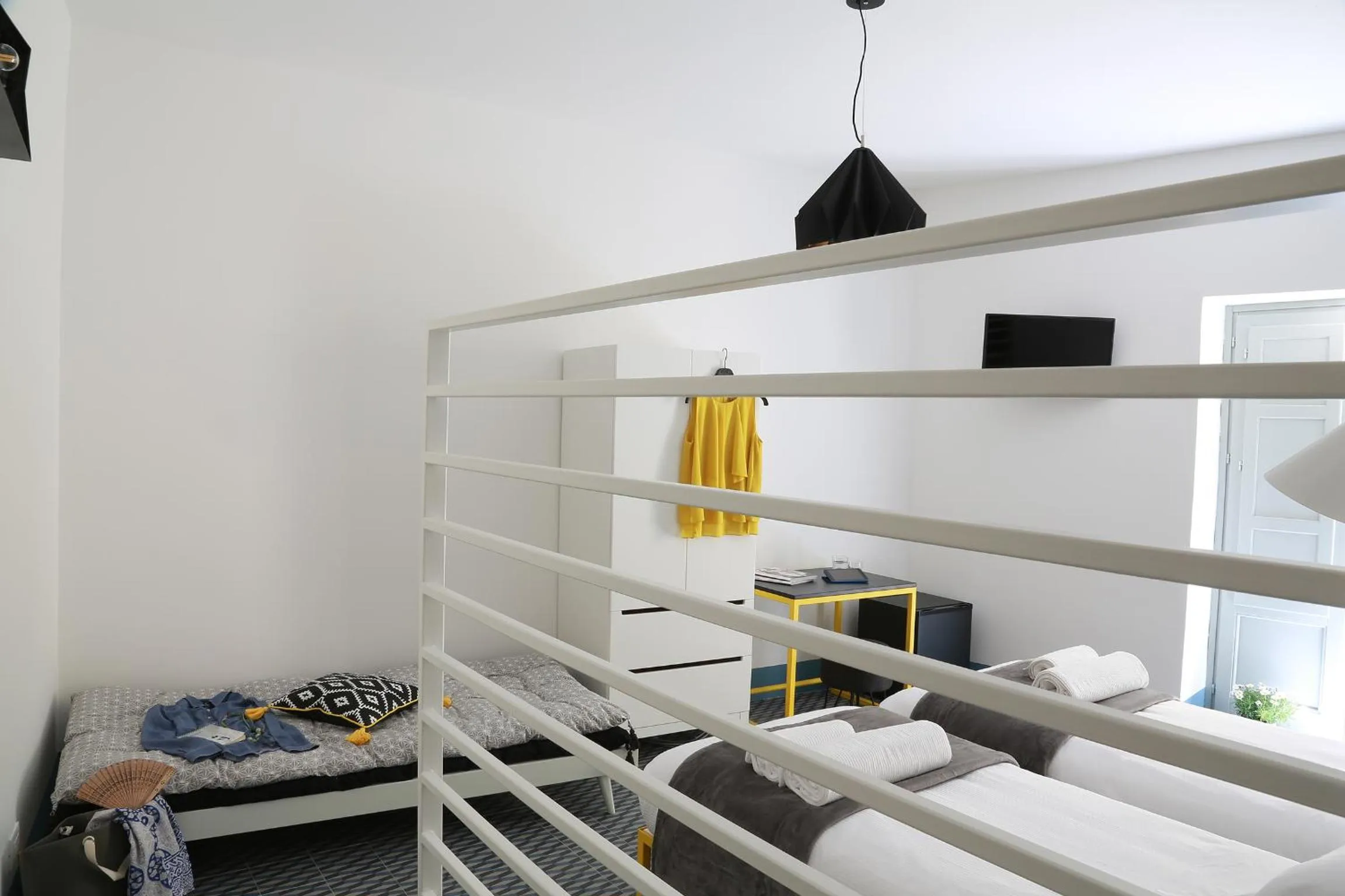 Bed in Intervallo Boutique Hotel