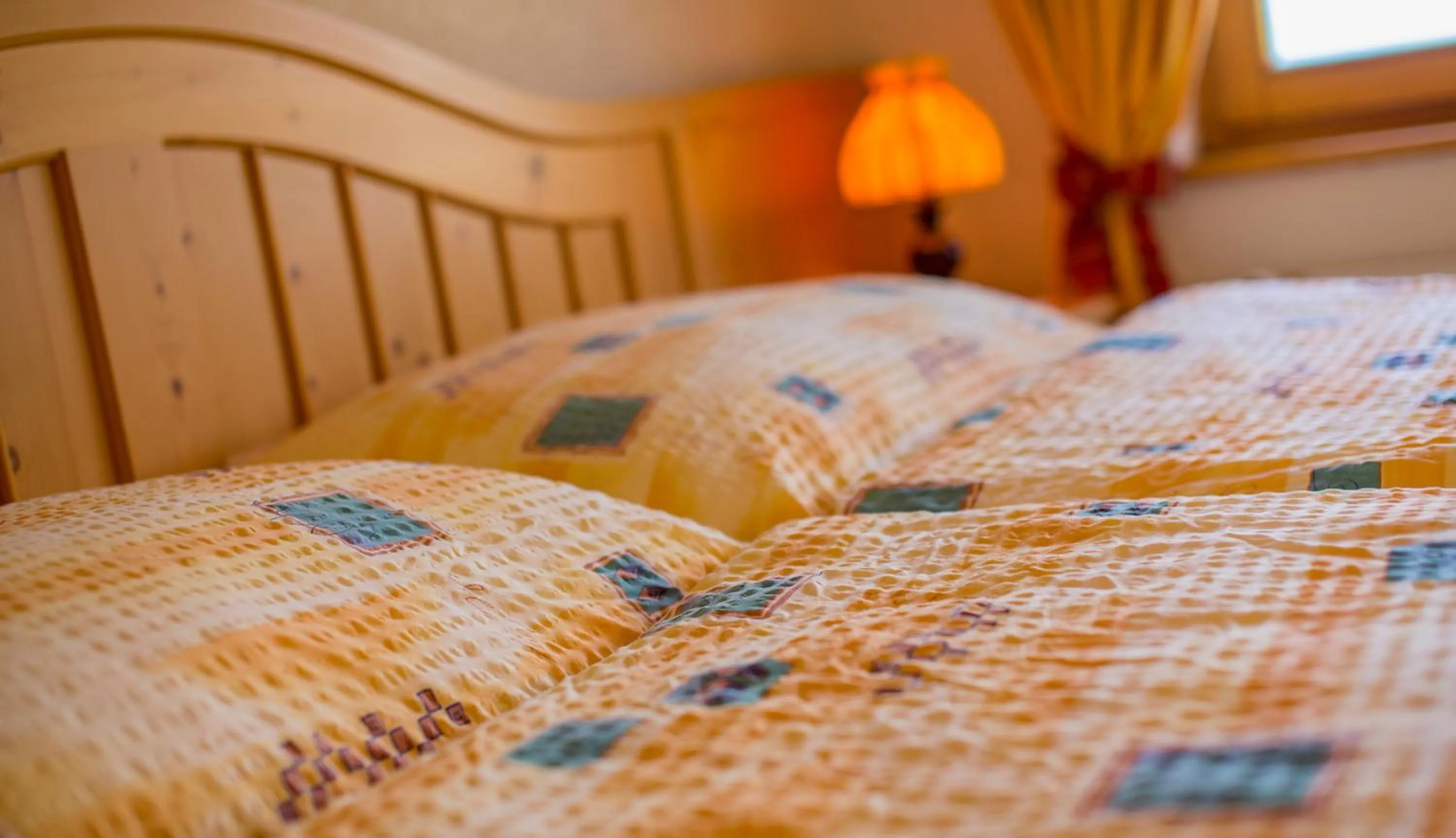 Bed in Alpenhotel zur Wildi Lauchernalp