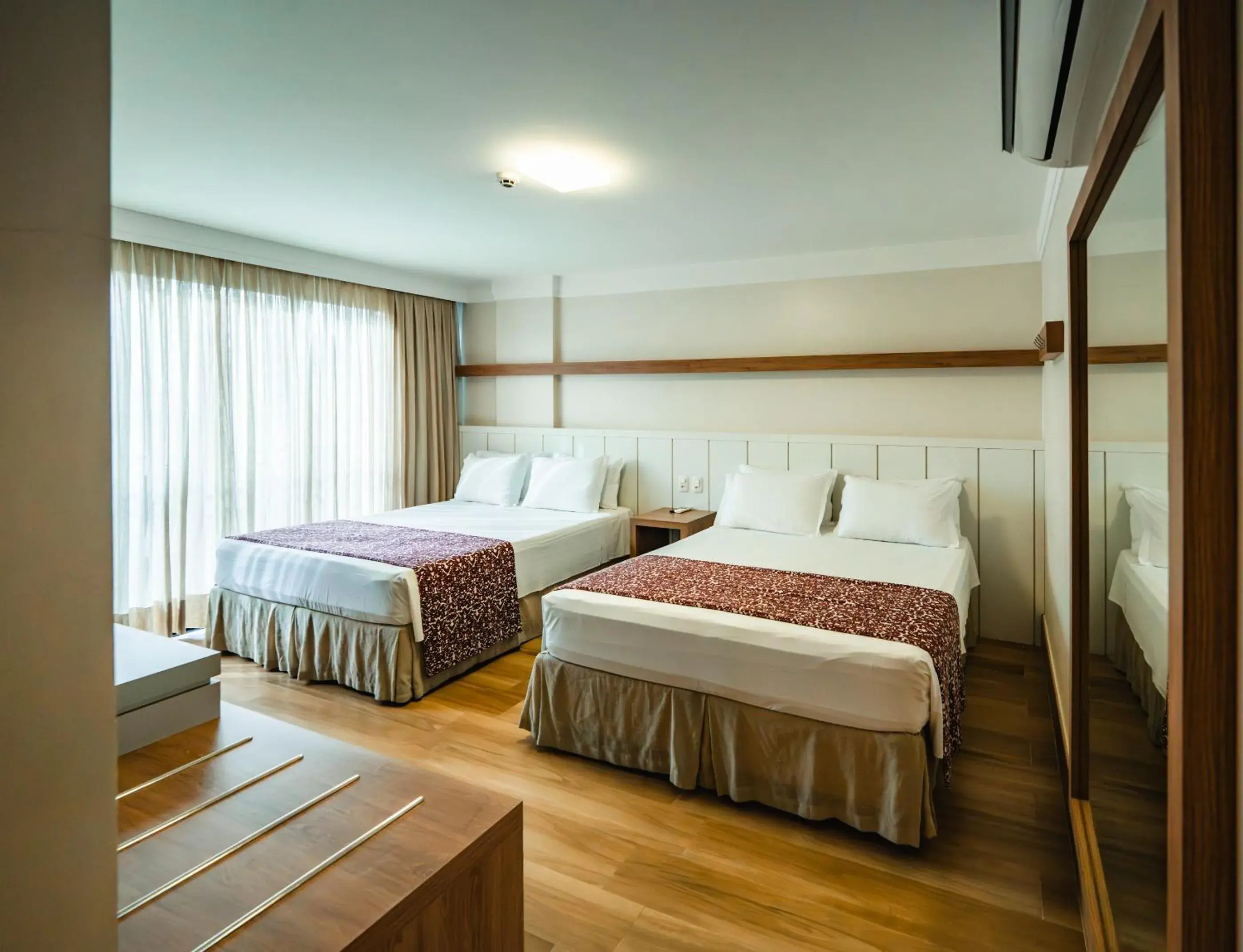 Quadruple Room - single occupancy in Hotel Vila Germânica Quadruple Room - single occupancy in Hotel Vila Germânica